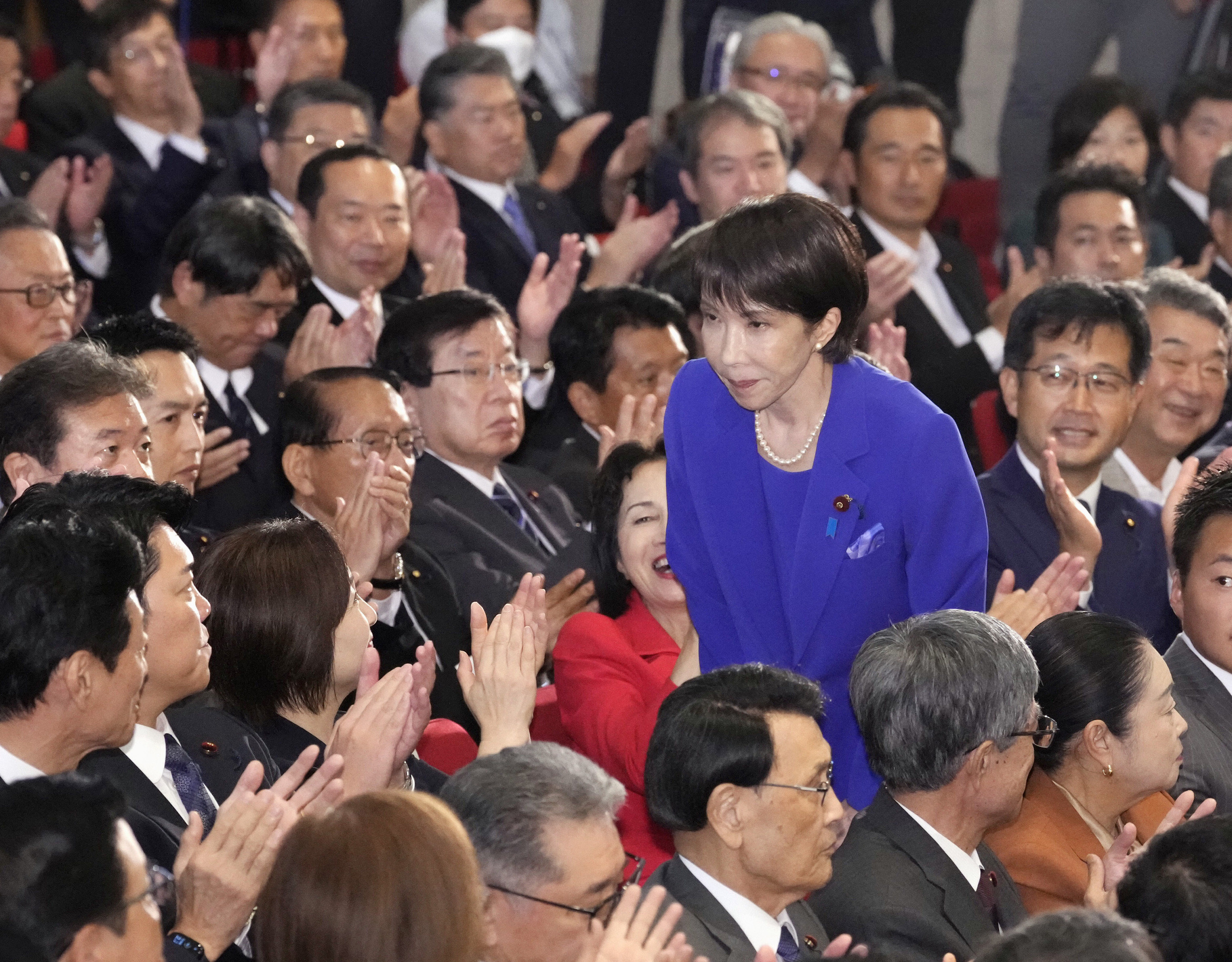 Japan’s Sanae Takaichi receives applause at the LDP’s headquarters in Tokyo after winning the party’s presidential election on October 4. Photo: Kyodo