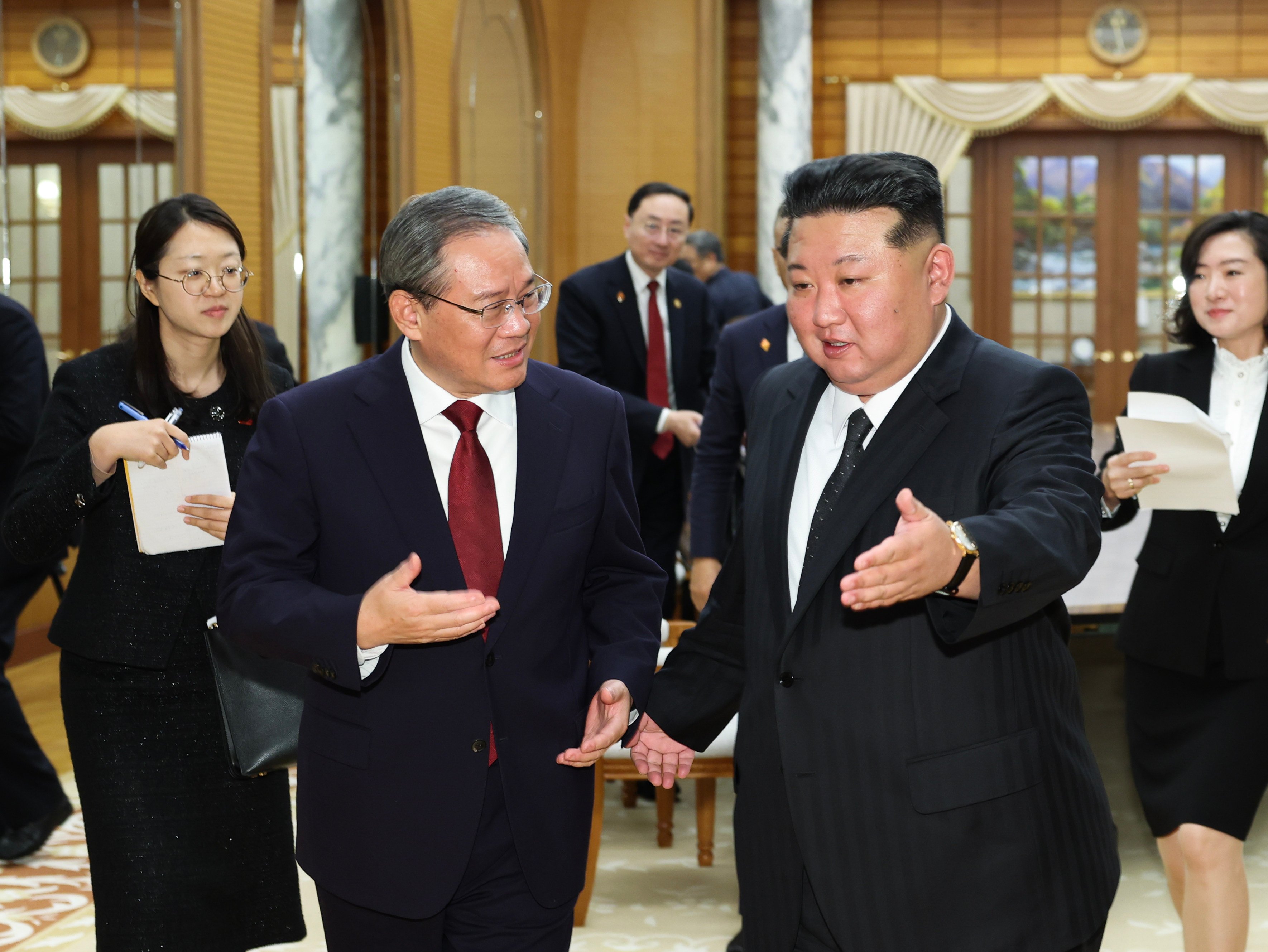 Chinese Premier Li Qiang (left) meets North Korean leader Kim Jong-un in Pyongyang on Thursday. Photo: Xinhua