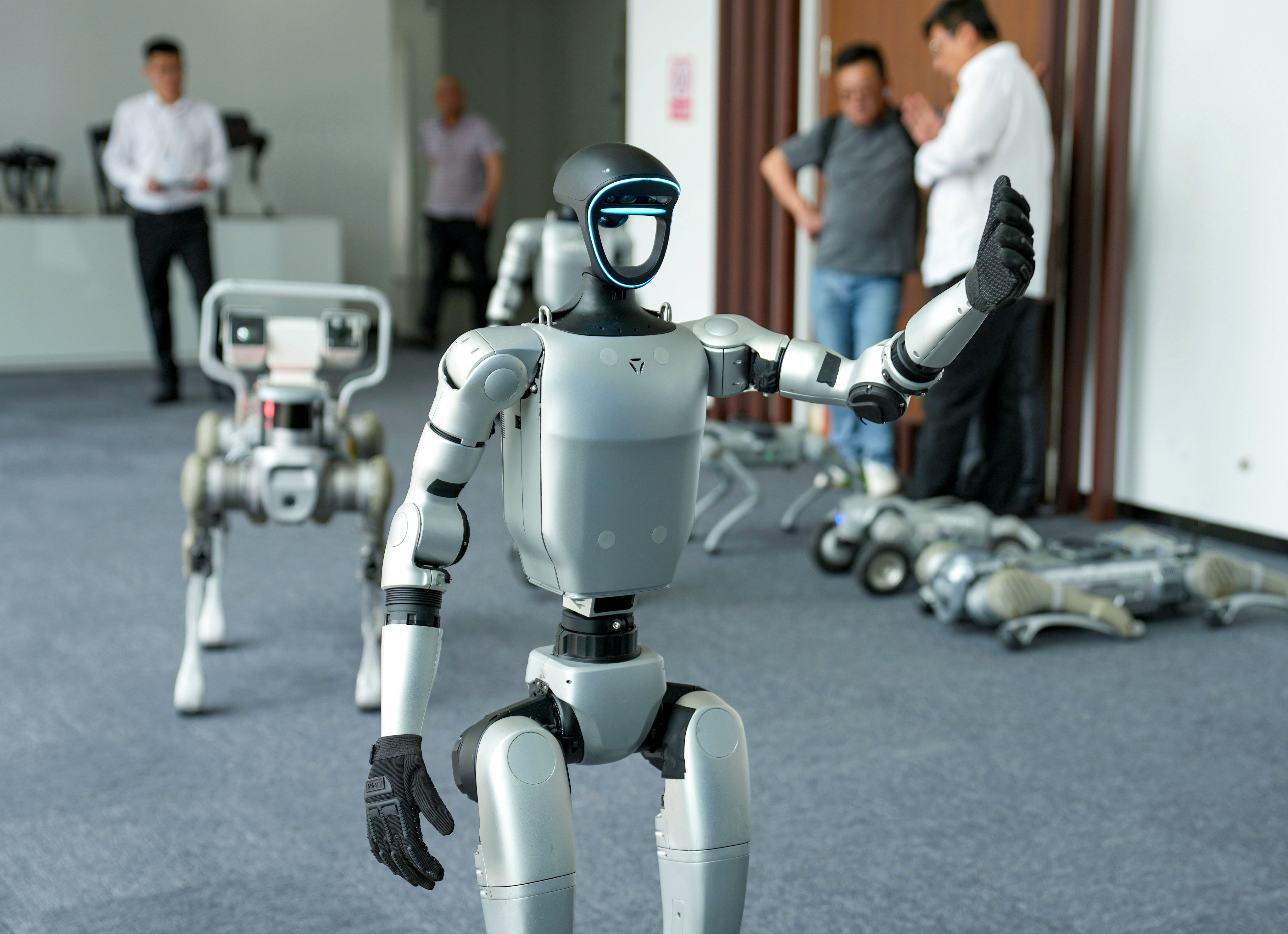 A Unitree G1 humanoid robot performs in the company’s exhibition hall in Hangzhou, April 23, 2025. Photo: Xinhua