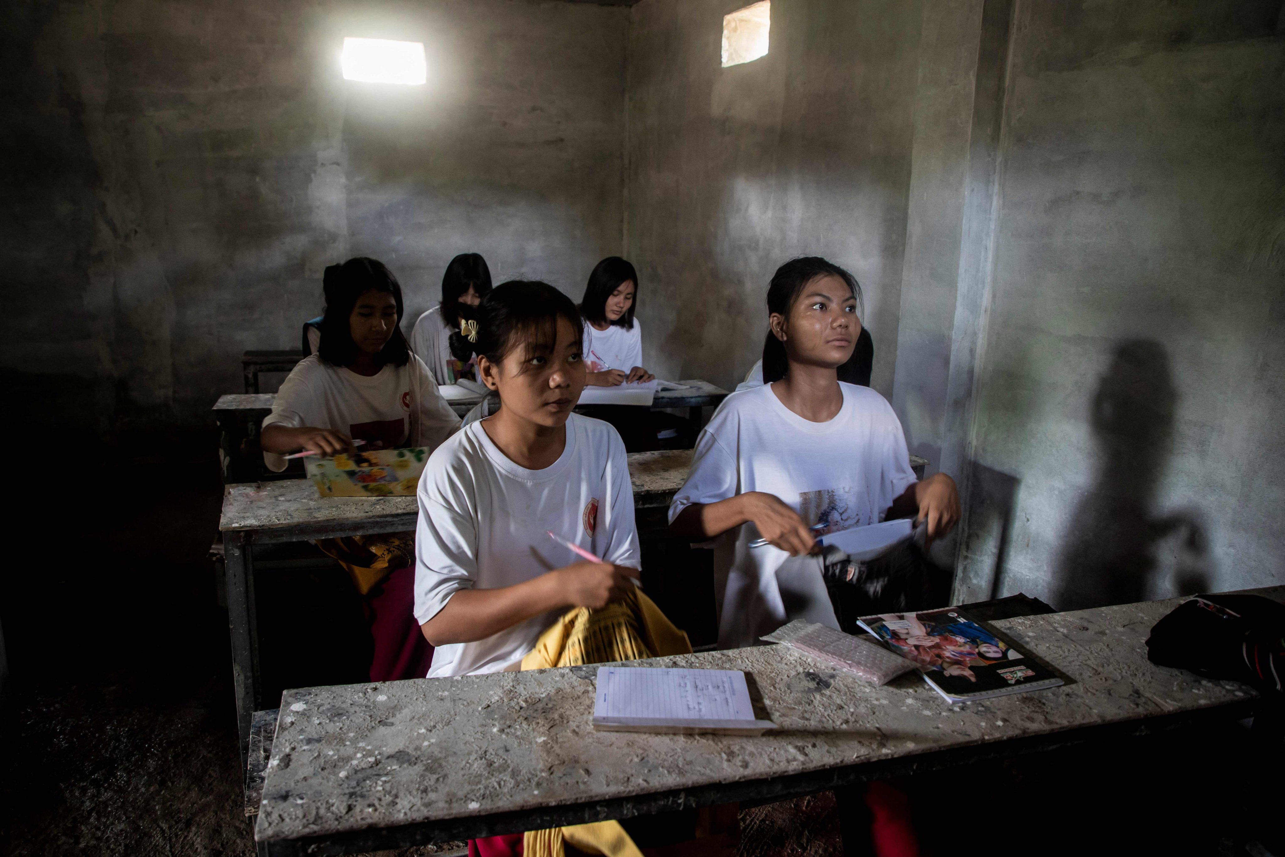 Students attend school in a concrete bunker at a village in the Sagaing region on August 15. Photo: AFP