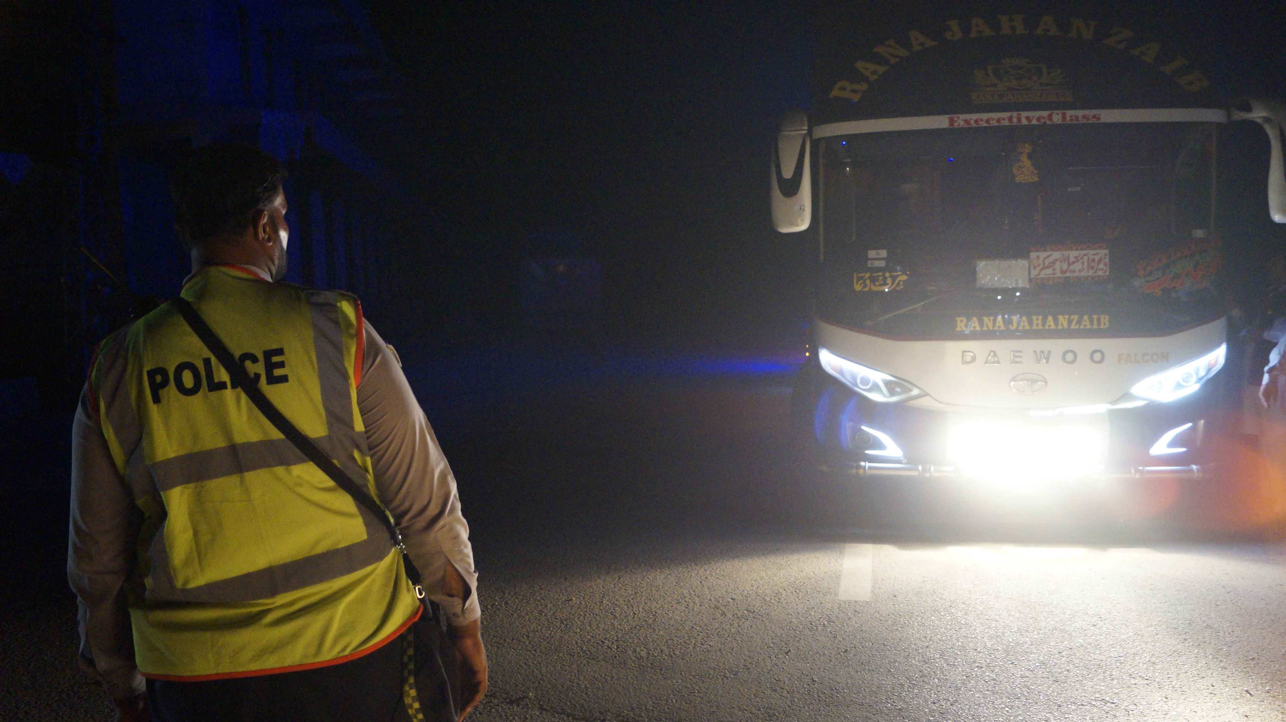 Pakistani police block set up a blockade as suspected militants attack a police station in Dera Ismail Khan on Friday night. Photo: EPA
