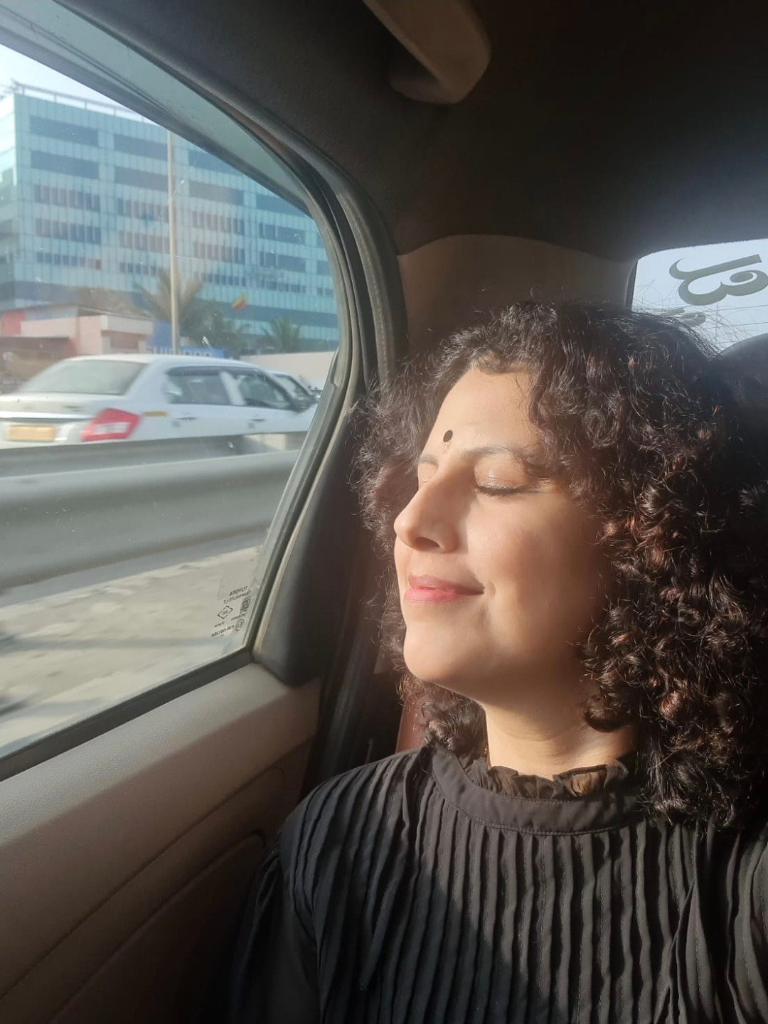 Pathak, with a new mane of curlier hair, exhales on her way to a writing retreat in Bangalore months after her treatment for breast cancer ended in 2023. Photo: Aarti Pathak