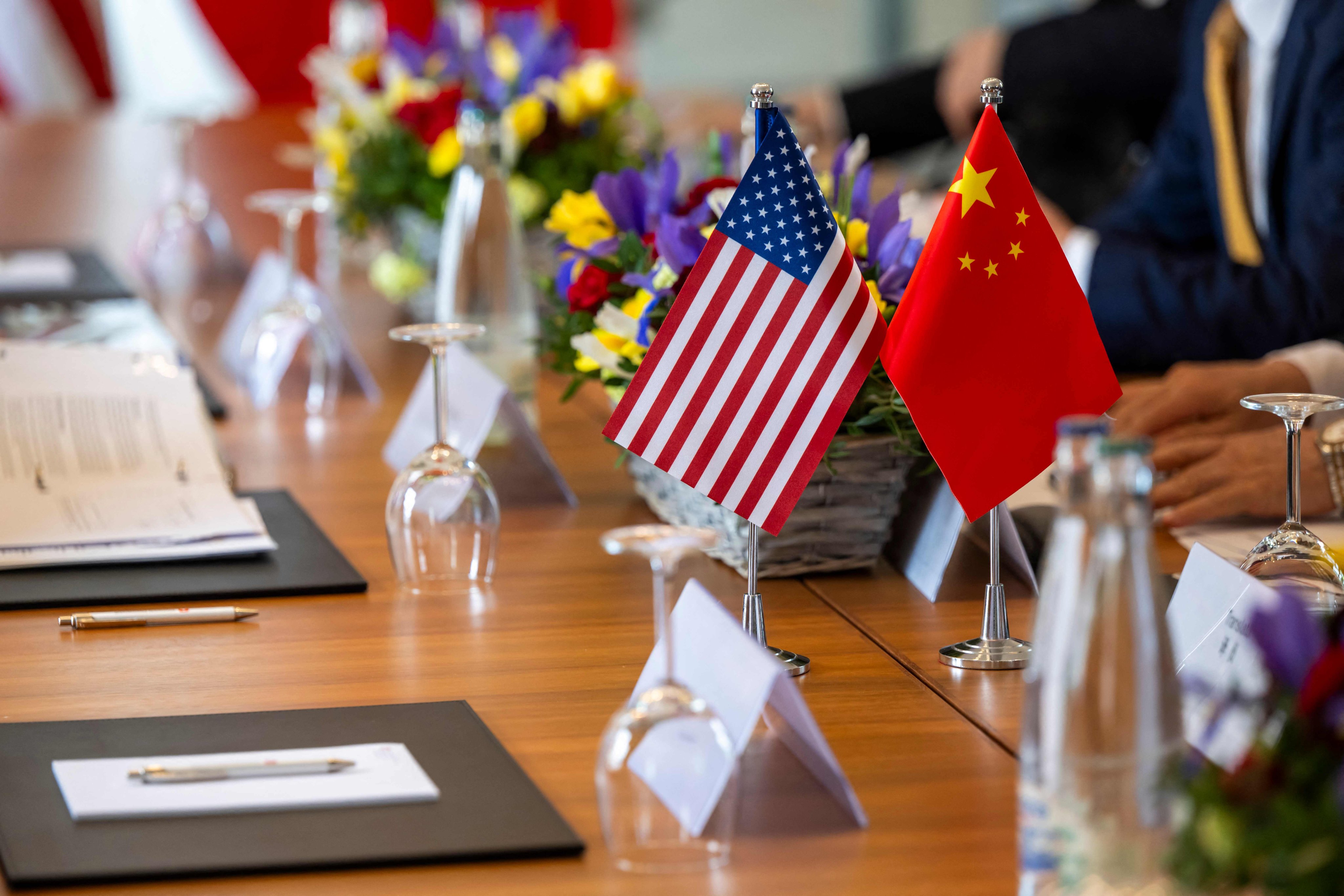 US and China flags on display in Geneva, Switzerland on May 10, 2025. Photo: AFP