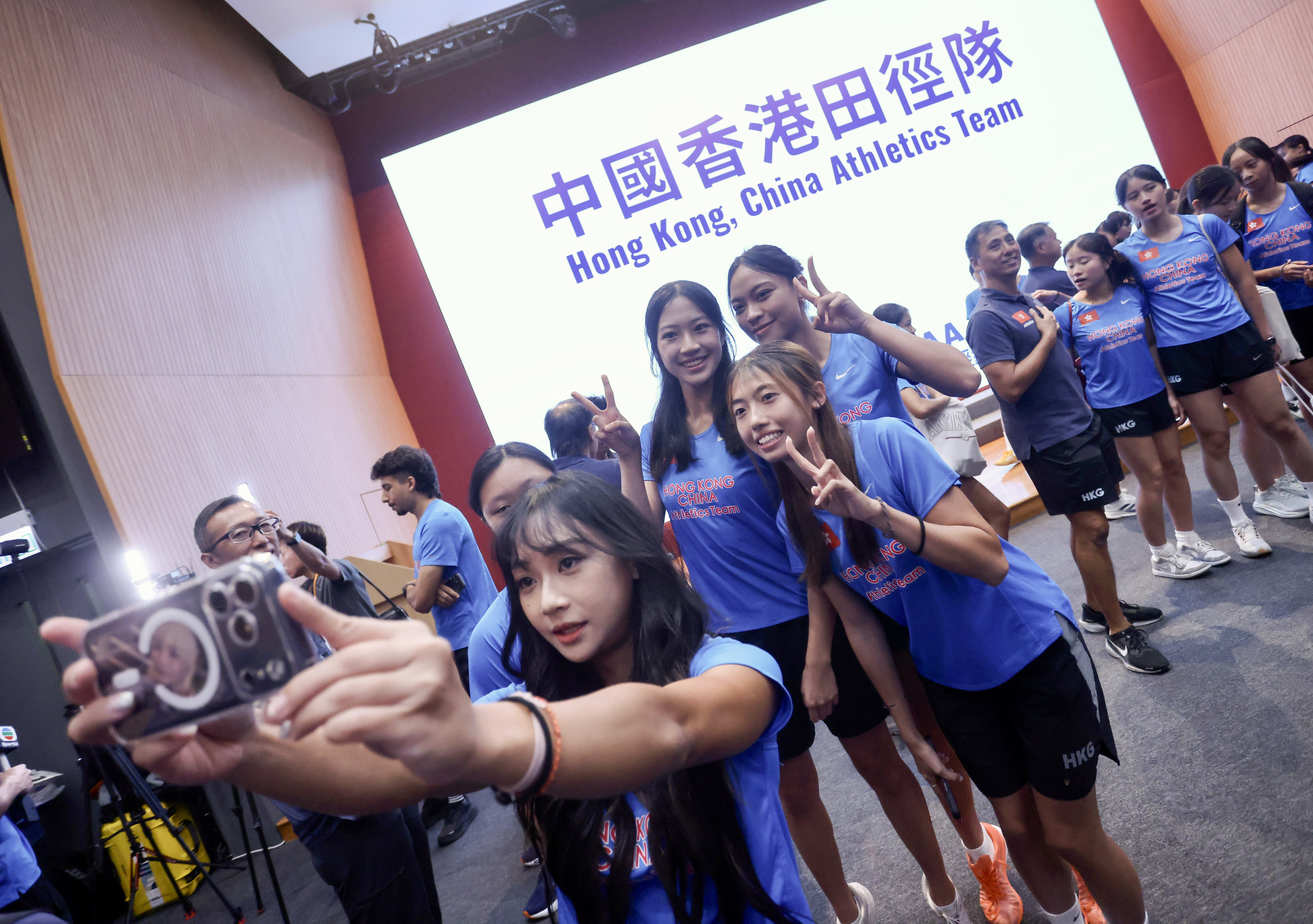 Chloe Pak (centre) poses for a selfie with her Hong Kong relay teammates. Photo: Jonathan Wong