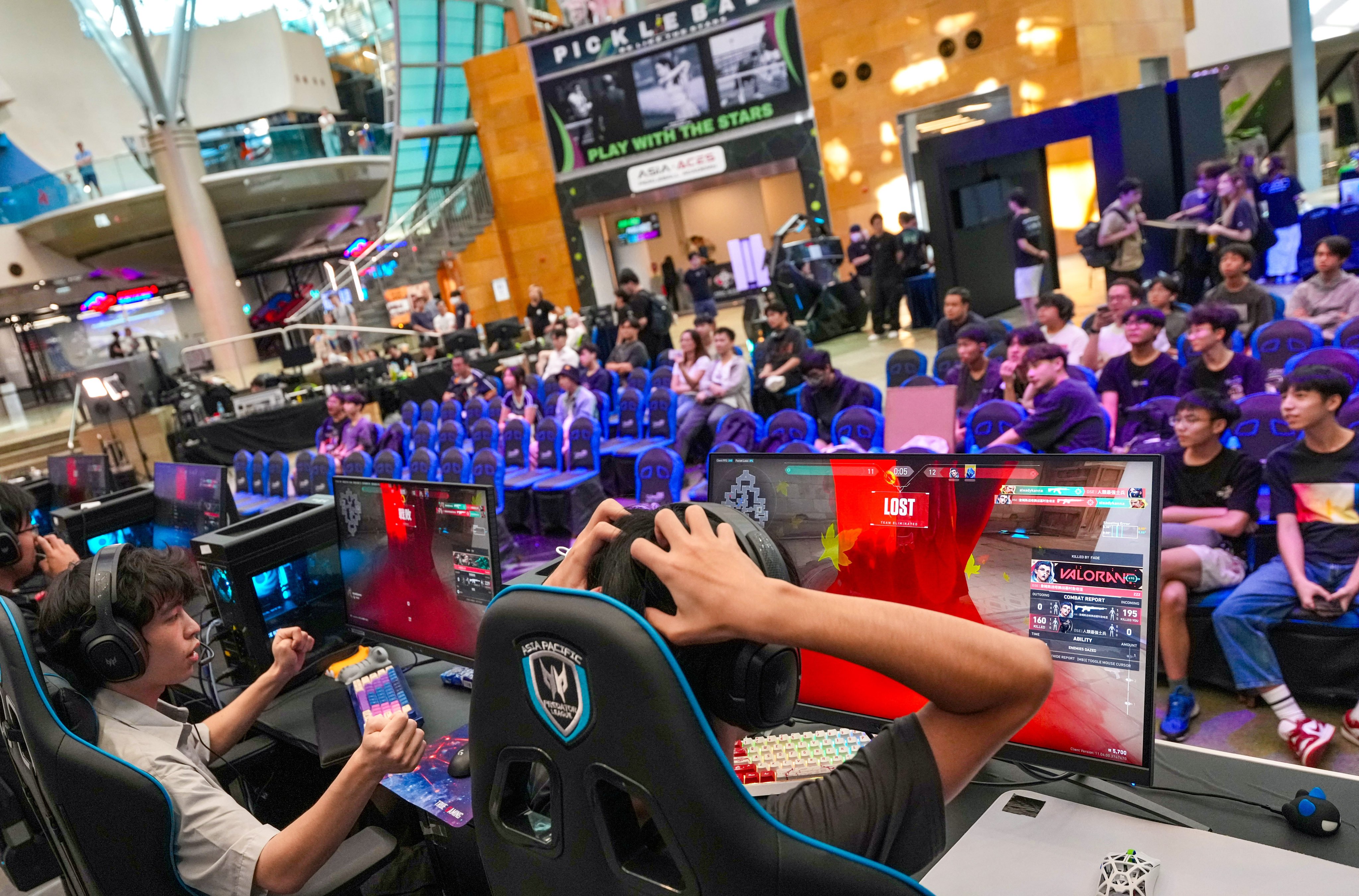 Players and fans enjoy an e-sports event on August 30, 2025, at CyberArena in the Cyberport Mall. Photo: Karma Lo