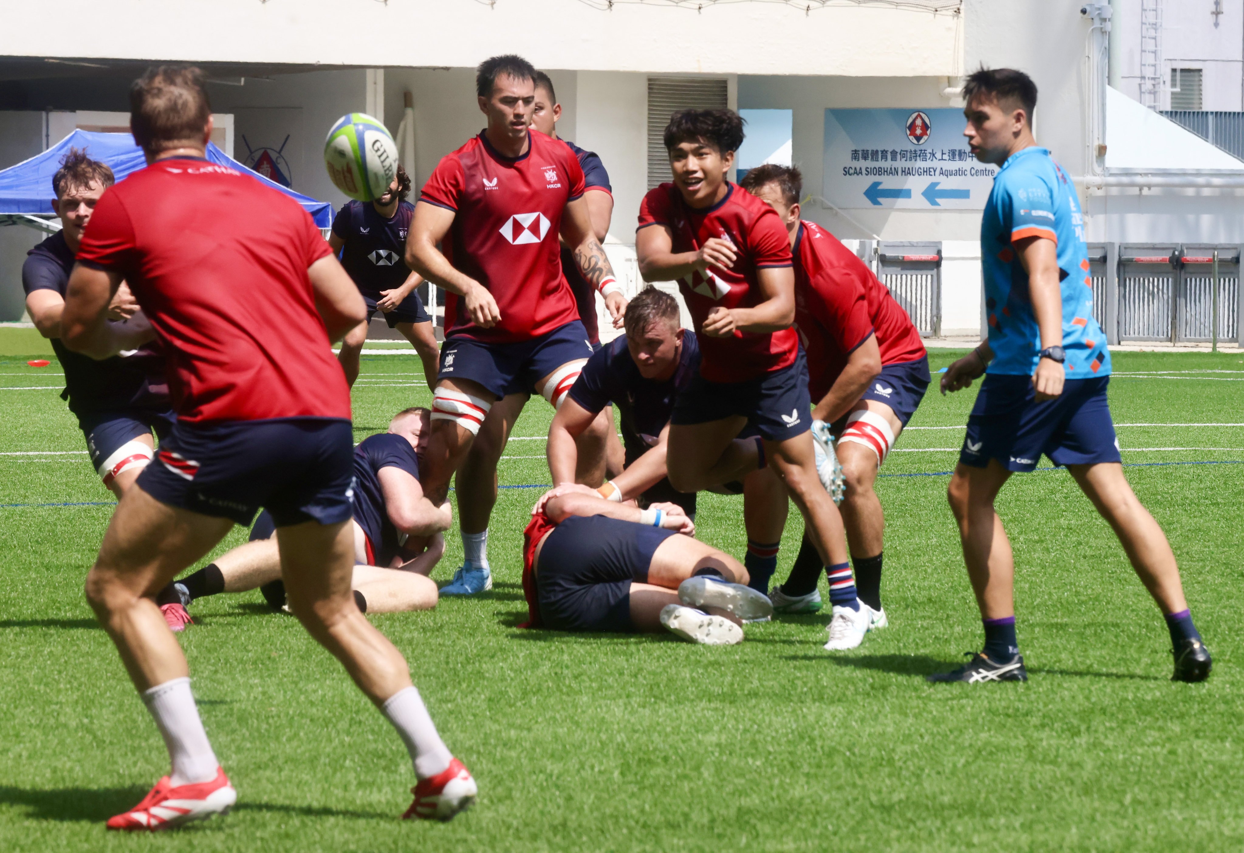 Scrum-half Eric Chui (centre) was “going well” against the Japanese side before going off with an injury. Photo: Jonathan Wong