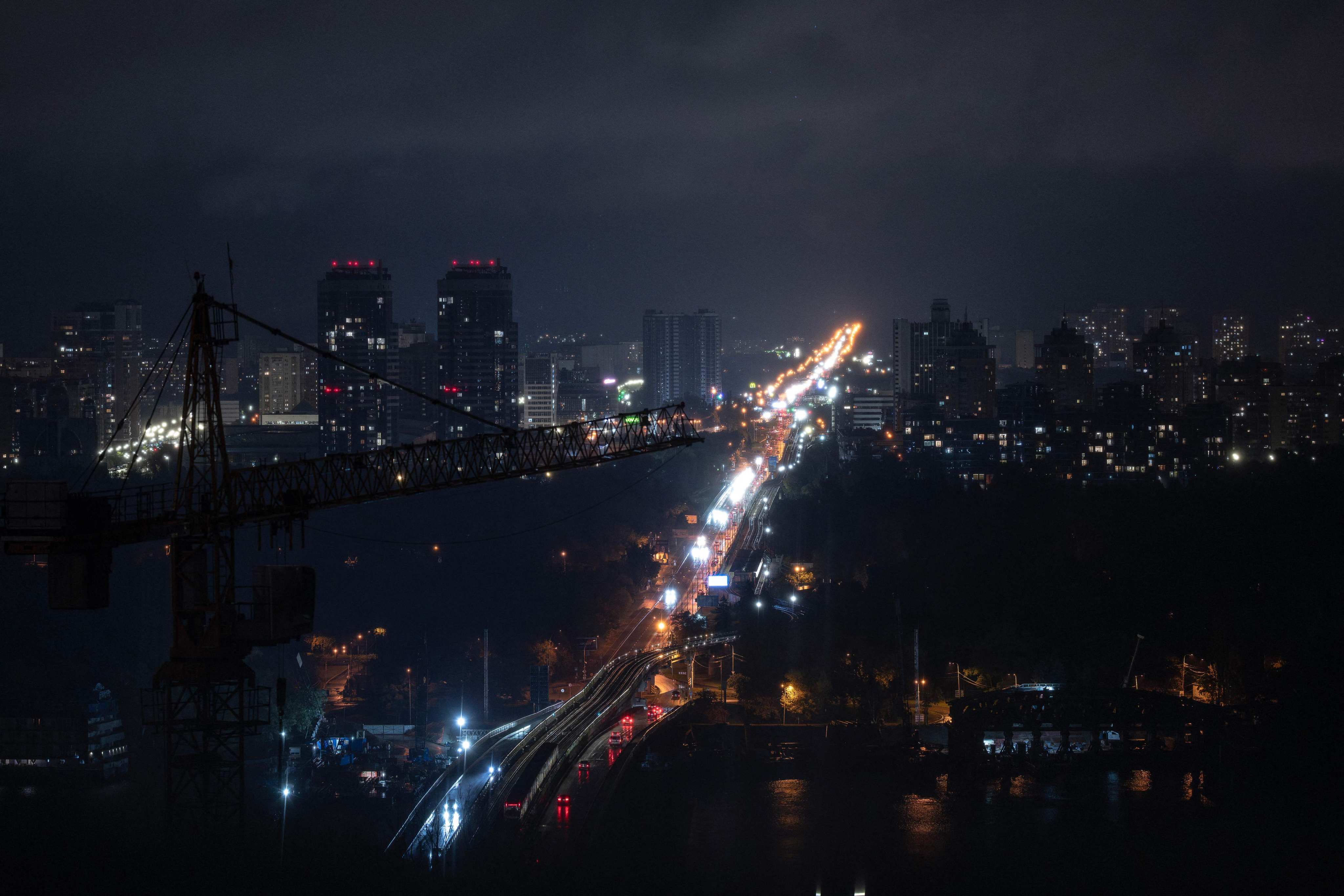 A general view of residential buildings during a power outage in Kyiv on Friday, following Russian attacks on Ukraine that cut power to thousands and killed a seven-year-old boy, authorities said. Photo: AFP