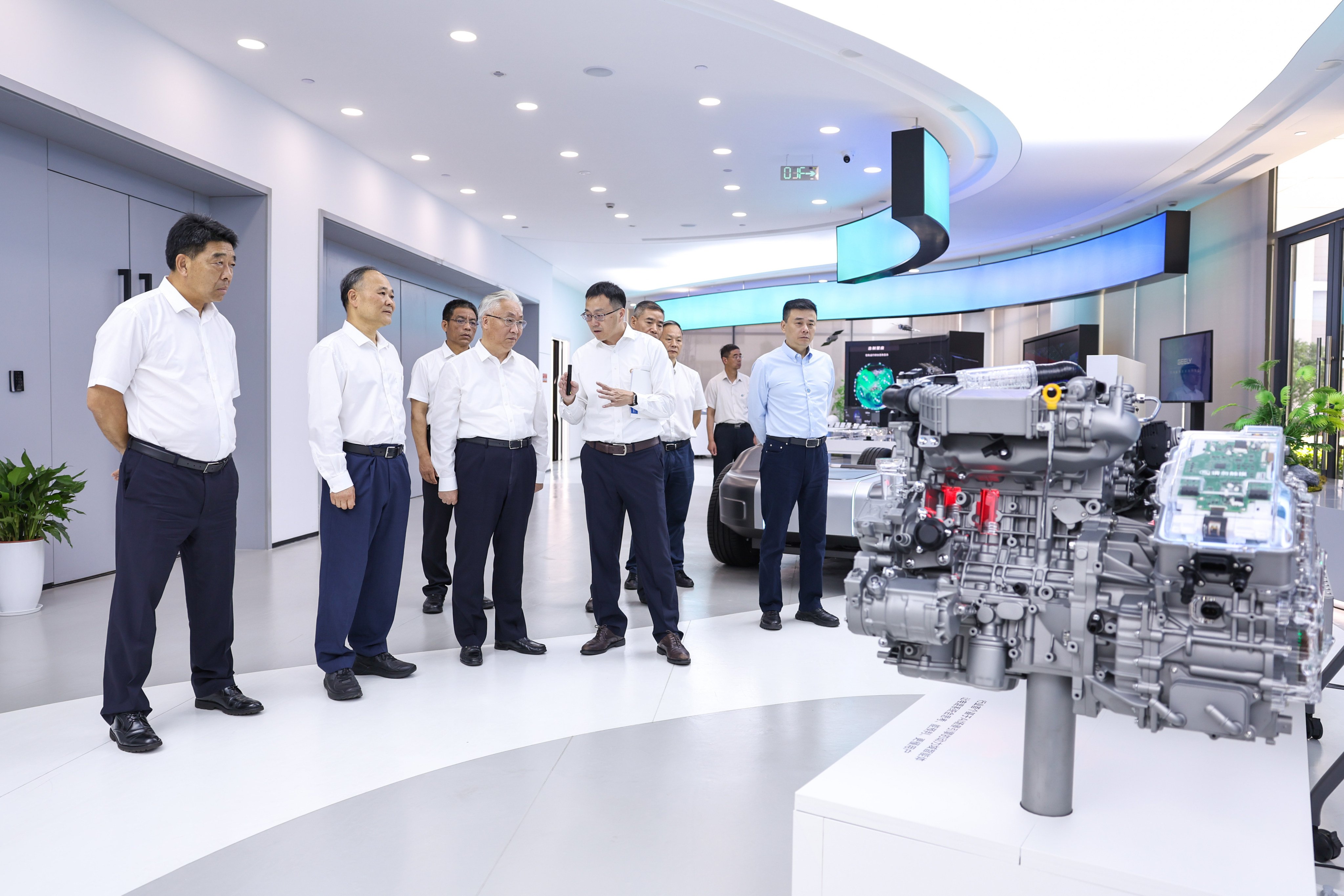 Vice-Premier Zhang Guoqing (third from left) visits an enterprise manufacturing all-solid-state batteries for new energy vehicles, in Zhejiang province on Friday. Photo: Xinhua