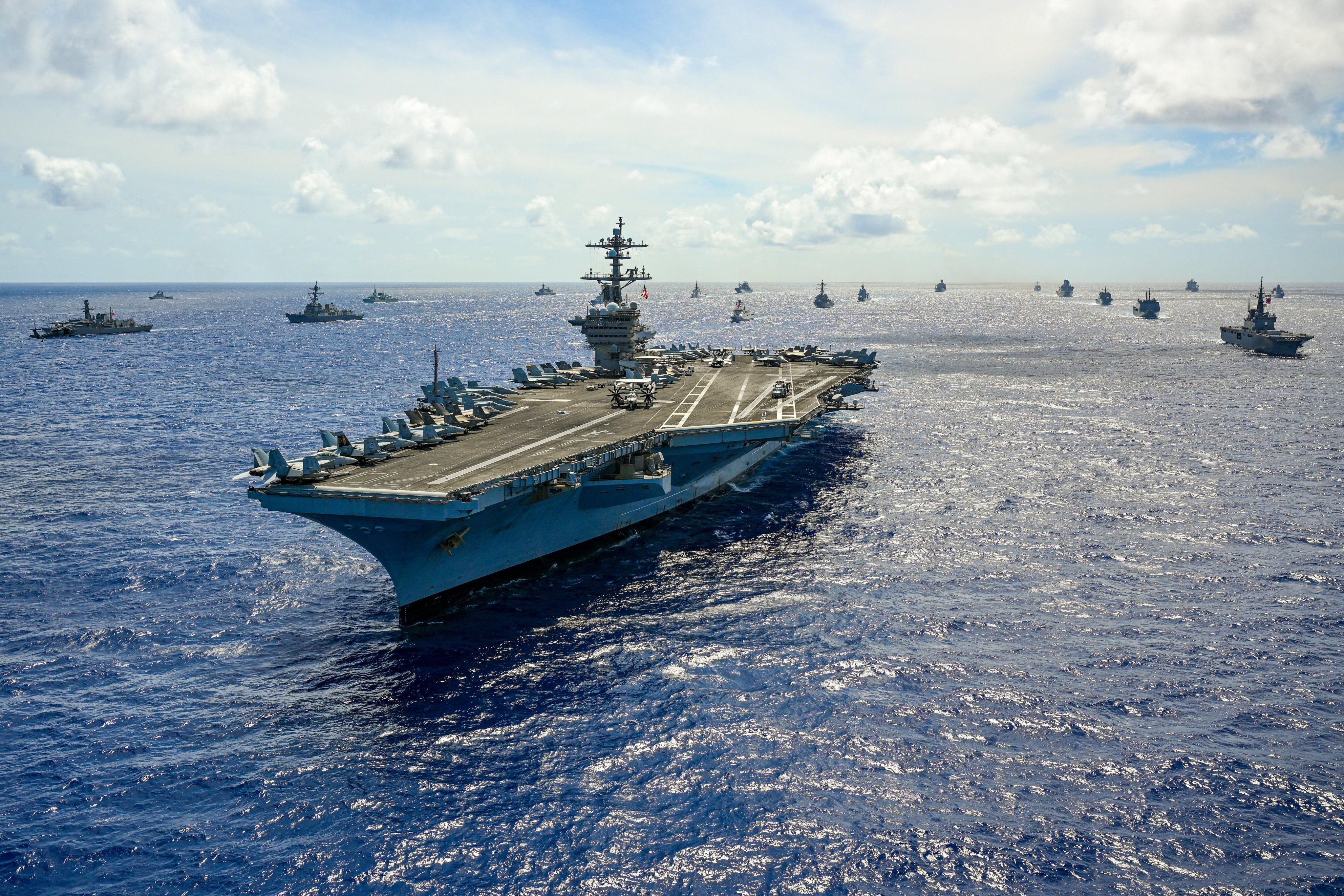A US aircraft carrier leads a group of warships off the coast of Hawaii during Rimpac, the world’s largest multinational maritime drill, on July 22, 2024. Photo: Handout