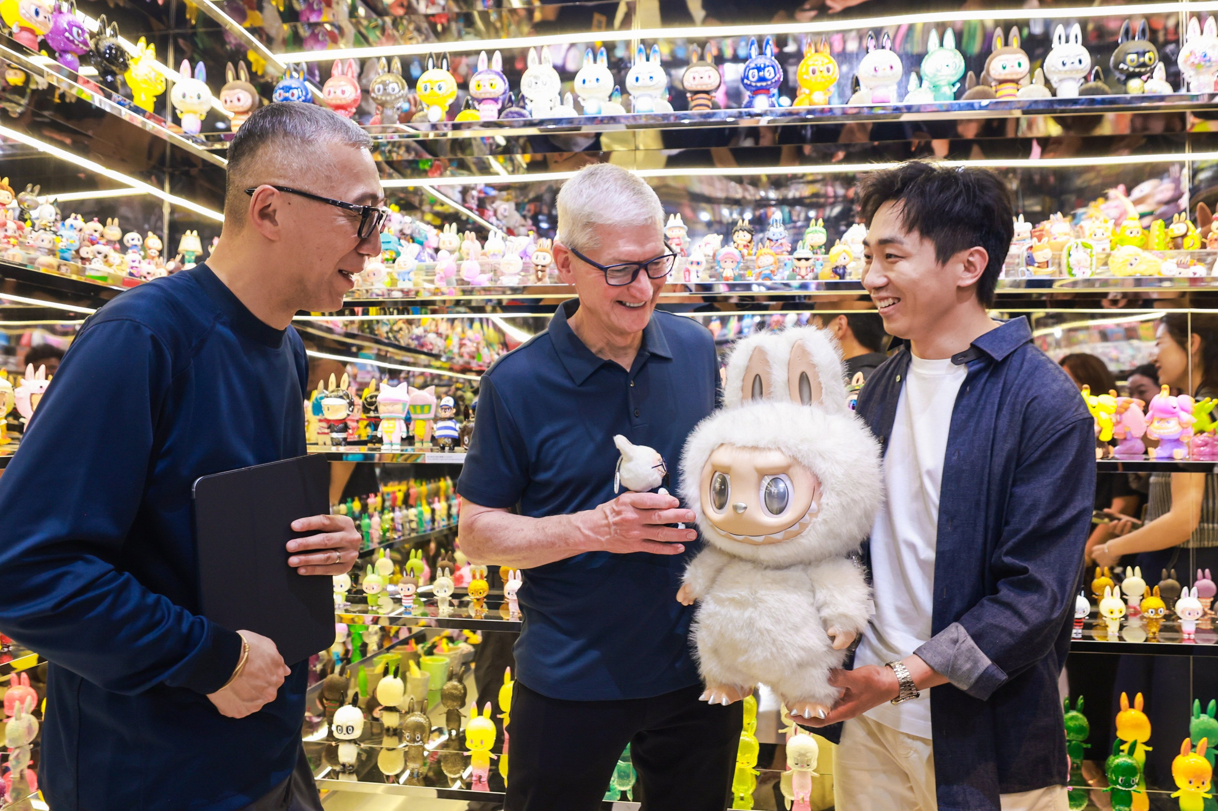 Labubu creator Kasing Lung (left), Apple CEO Tim Cook and Pop Mart CEO Wang Ning meet at a Labubu exhibition in Shanghai on Monday. Photo: Handout