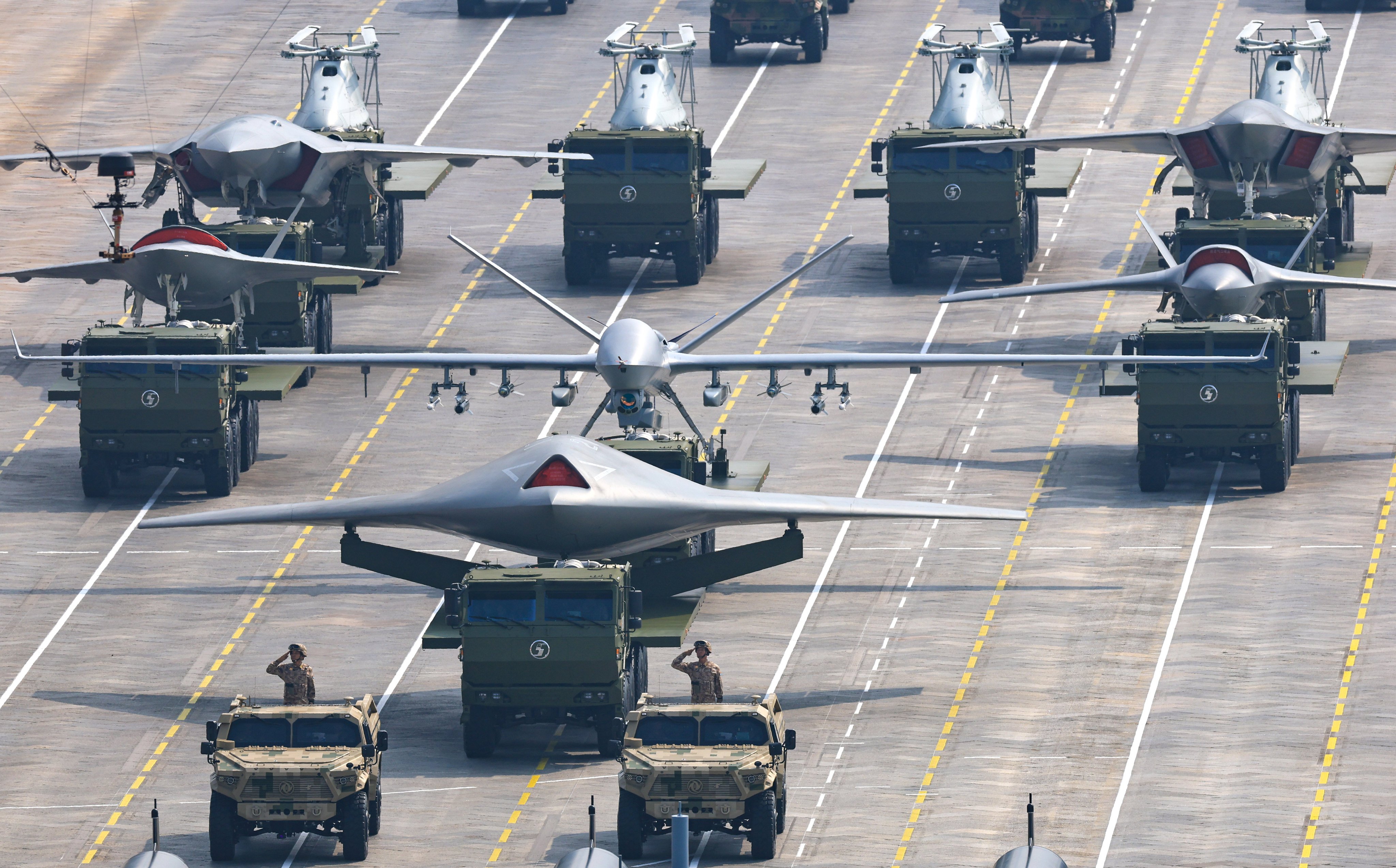 Airborne uncrewed vehicles are showcased during the Victory Day military parade in Beijing on September 3. Weaponry paraded within formations during the event did not originate from a single theatre command or service branch. Photo: Xinhua
