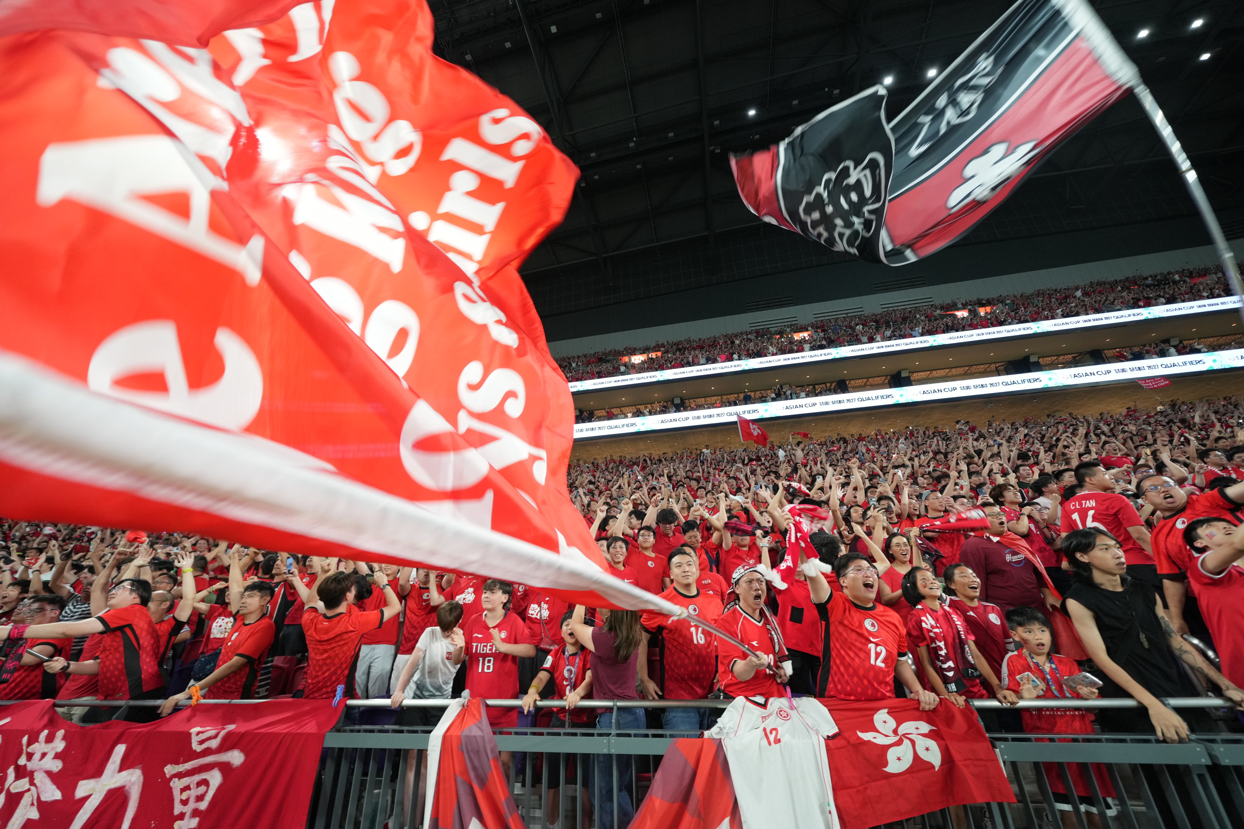 Hong Kong fans cheer on their team in the sold-out Asian Cup qualifier against India at Kai Tak Stadium in June. Photo: Sam Tsang