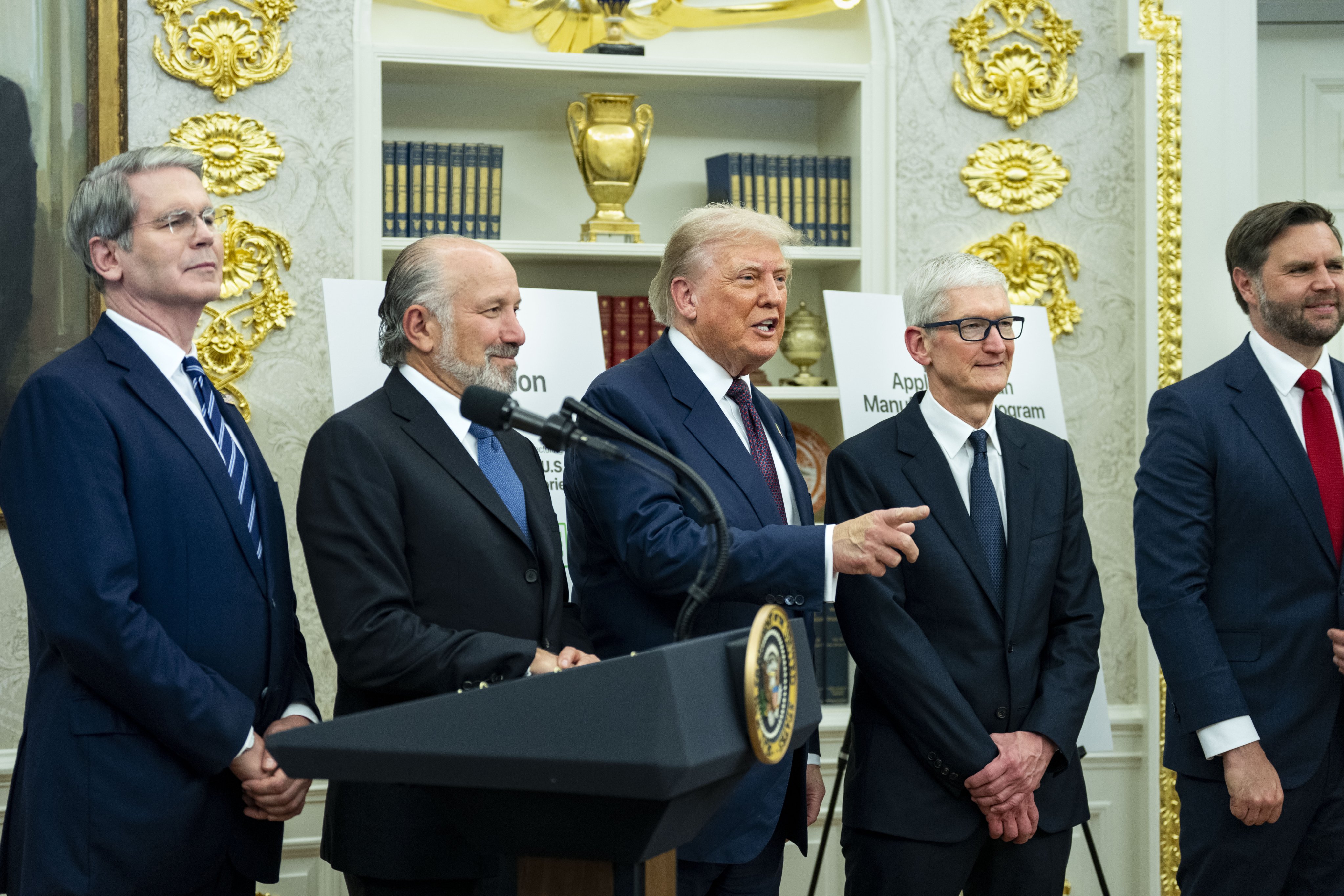 US Treasury Secretary Scott Bessent, US Commerce Secretary Howard Lutnick, US President Donald Trump, Apple CEO Tim Cook and US Vice-President J.D. Vance take a group photo after announcing an additional US$100 billion Apple investment in the US in the Oval Office of the White House in Washington on August 6. Photo: EPA