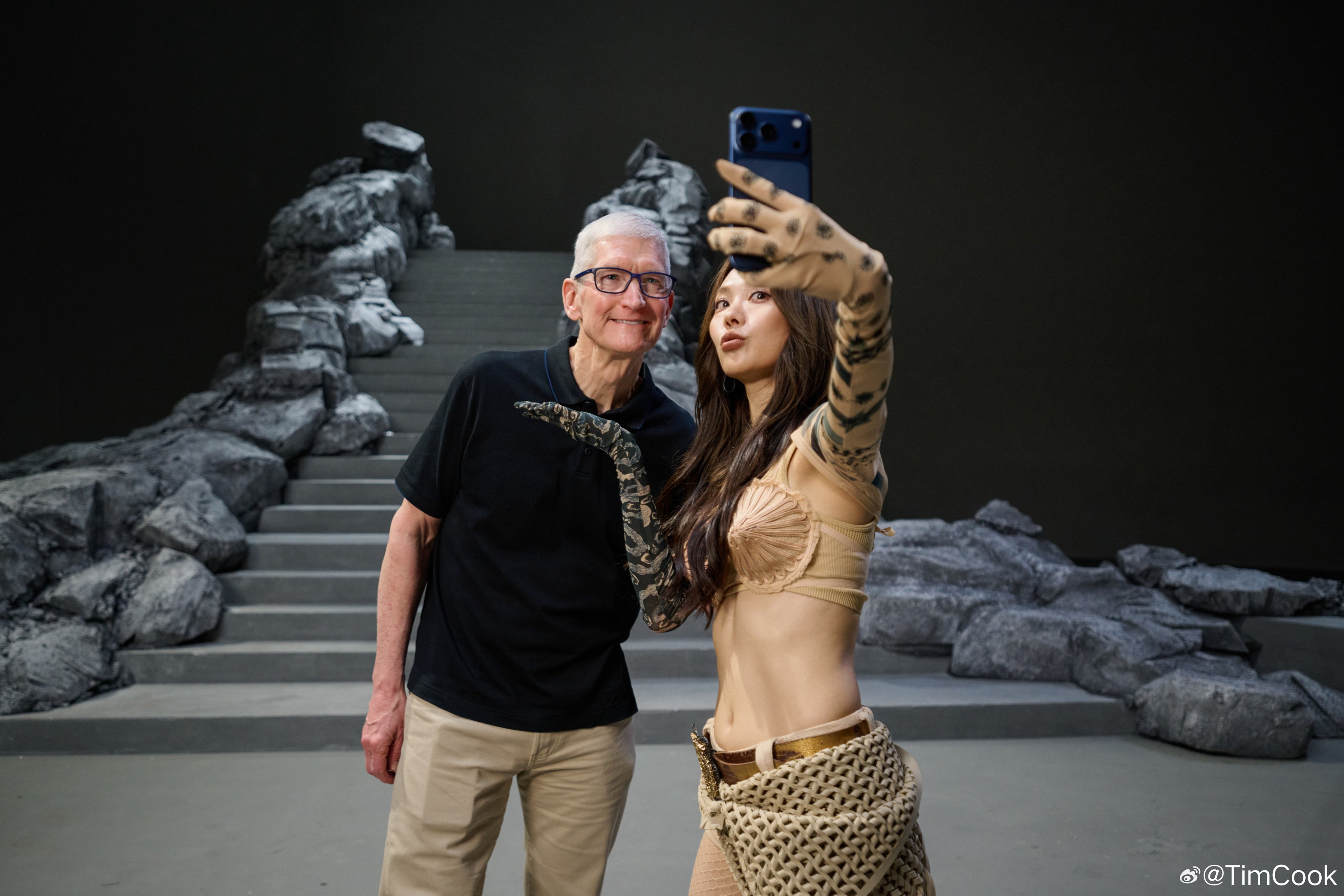Apple CEO Tim Cook takes a selfie with Chinese singer-actress Wang Feifei at her music video set in Shanghai on Tuesday. Photo: Handout