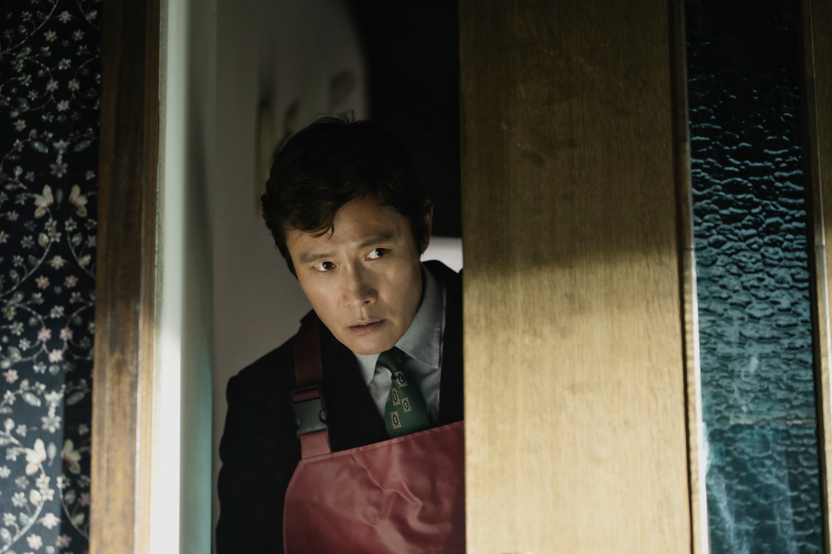 Lee Byung-hun in a still from No Other Choice.