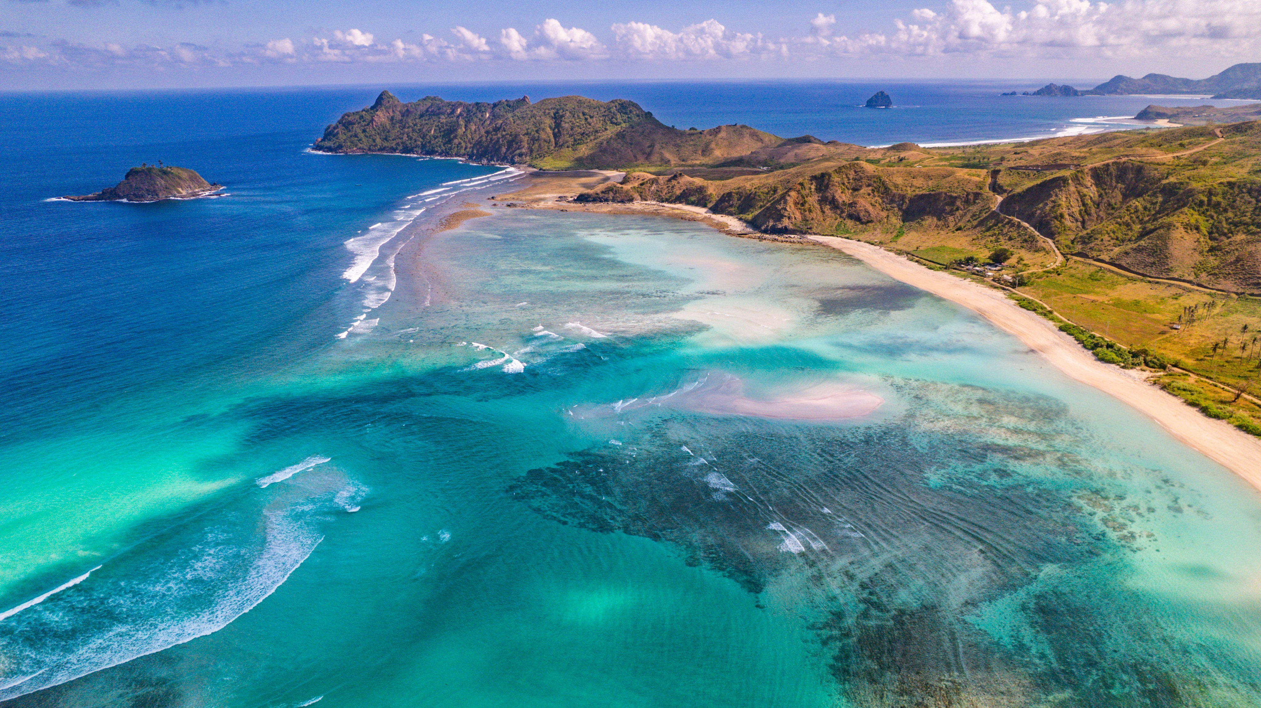 The stunning turquoise coastal waters of Indonesia’s Buwun Mas village, where Australian investors are planning a luxury resort. Photo: Marina Bay City/Lombok/dpa