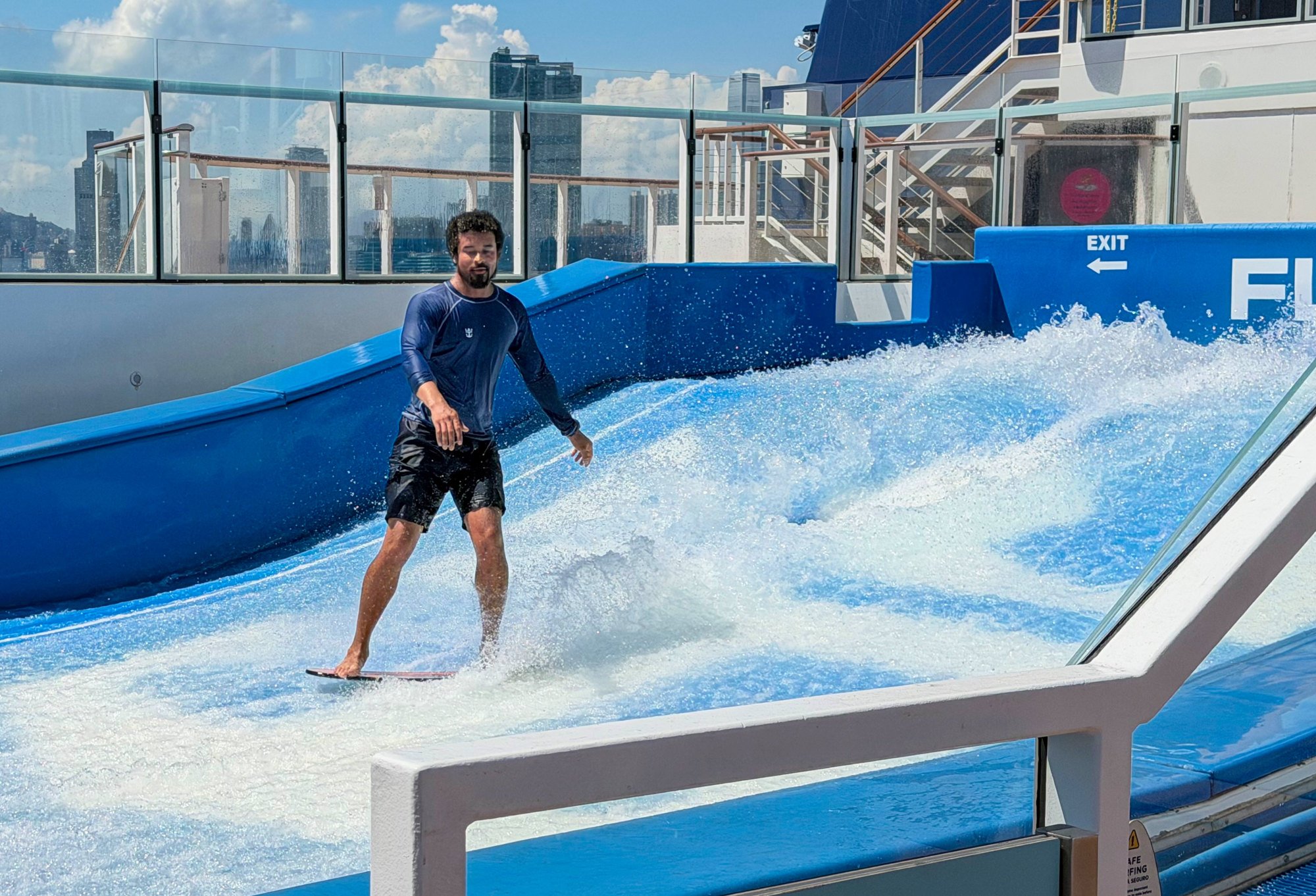 A surfer tests the waves on board the Ovation of the Seas mega cruise ship. Photo: Denise Tsang A surfer tests the waves on board the Ovation of the Seas mega cruise ship. Photo: Denise Tsang
