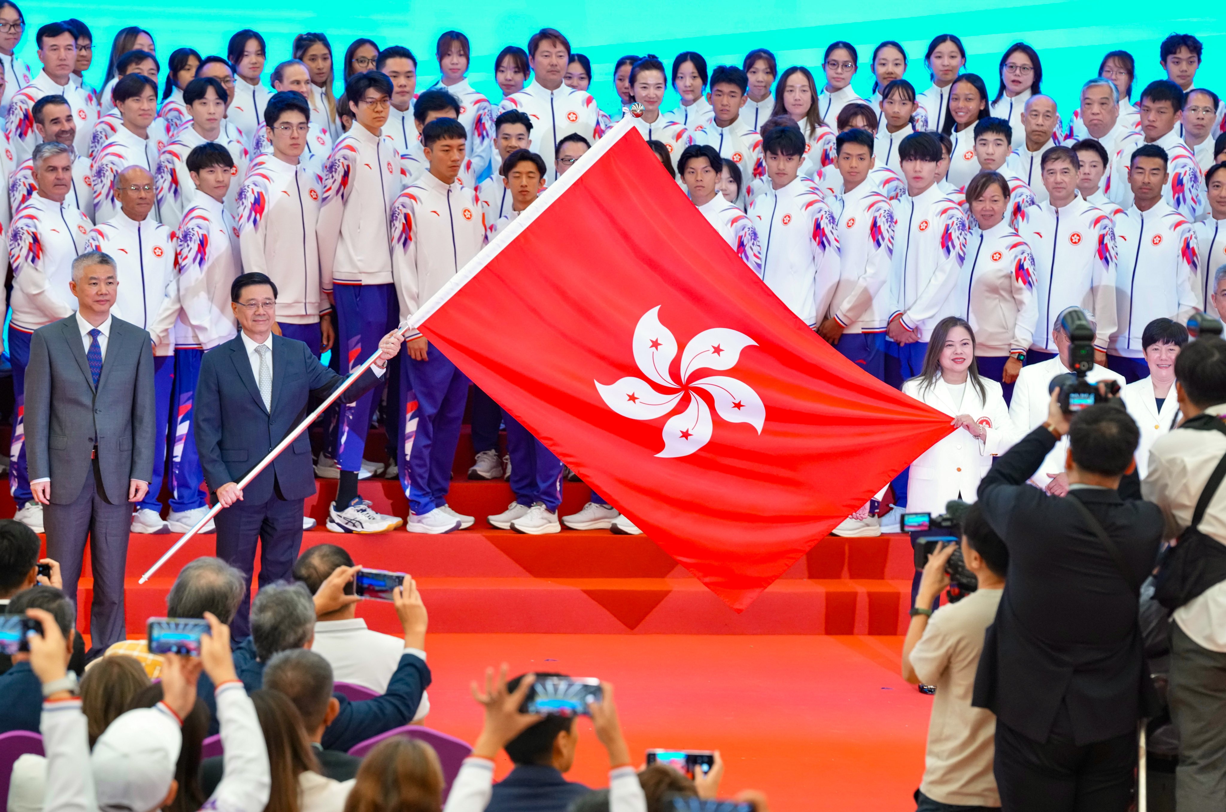 Front row from left: Sun Shangwu, deputy director of the central government’s liaison office in Hong Kong; Chief Executive John Lee and Rosanna Law, Secretary for Culture, Sports and Tourism and head of the Hong Kong delegation. Photo: Karma Lo