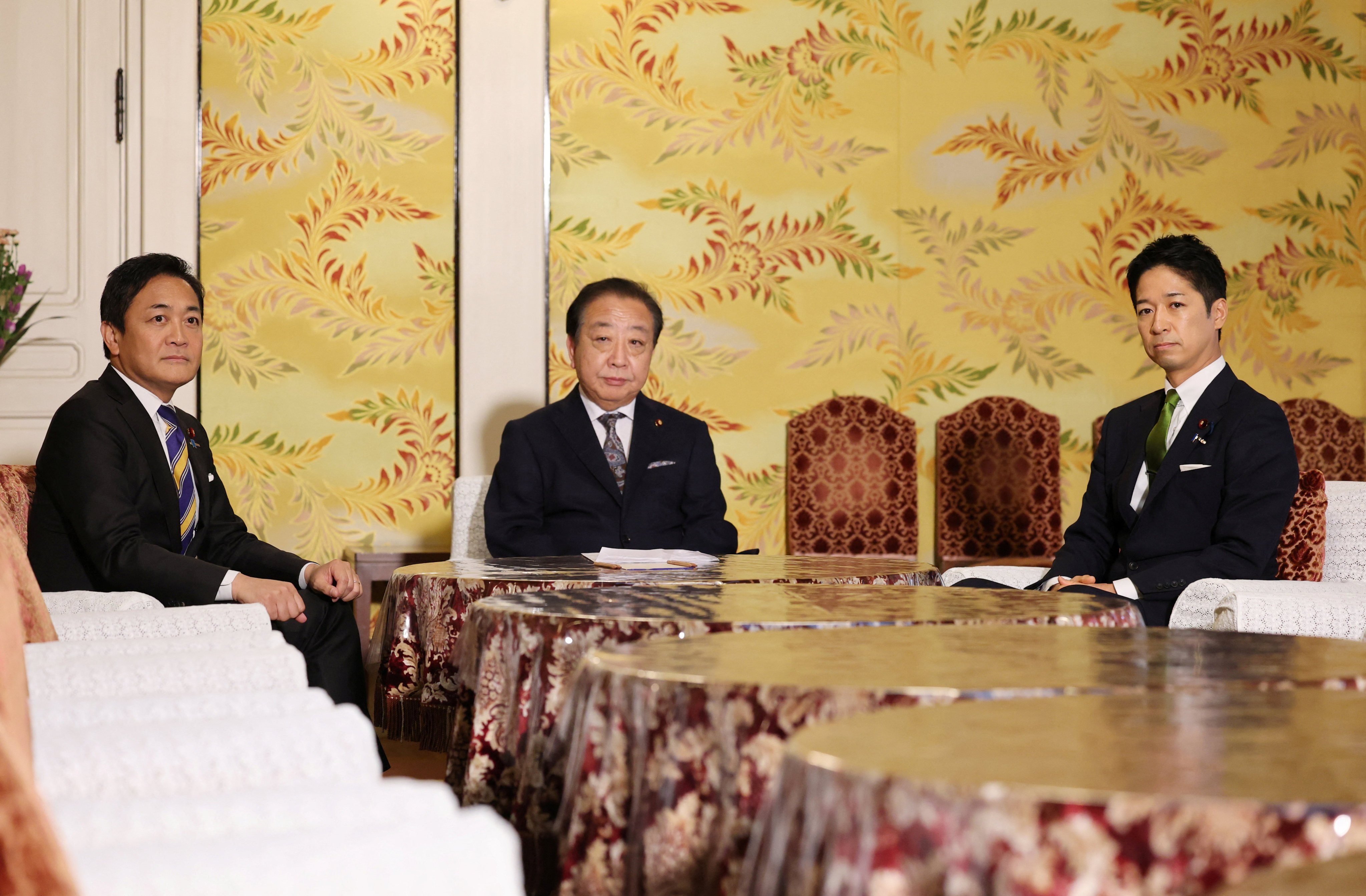 Japanese opposition leaders (from left) Yuichiro Tamaki of the Democratic Party for the People; Yoshihiko Noda of the Constitutional Democratic Party; and Hirofumi Yoshimura of the Japan Innovation Party meet on Wednesday to discuss banding together. Photo: Reuters