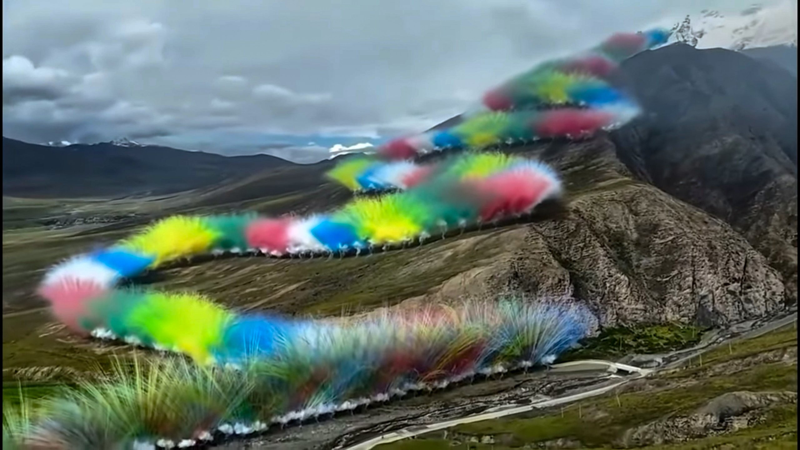 Fireworks in different colours explode all the way to the top of a hill in the Tibetan plateau as part of the advertising stunt on September 19. Photo: Handout