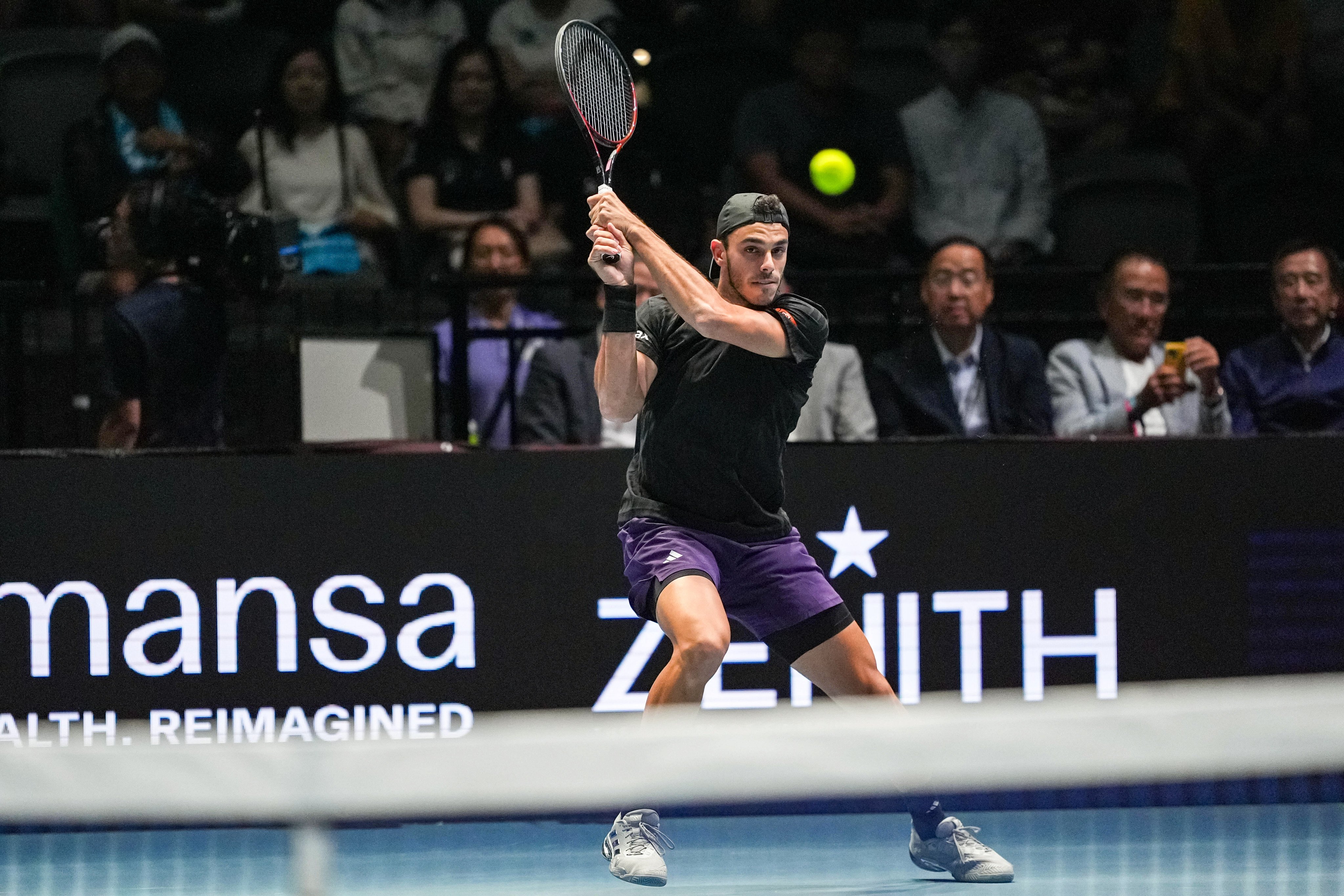 Francisco Cerundolo returns the ball to Jenson Brooksby during their UTS Hong Kong final at Kai Tak Arena. Photo: Eugene Lee