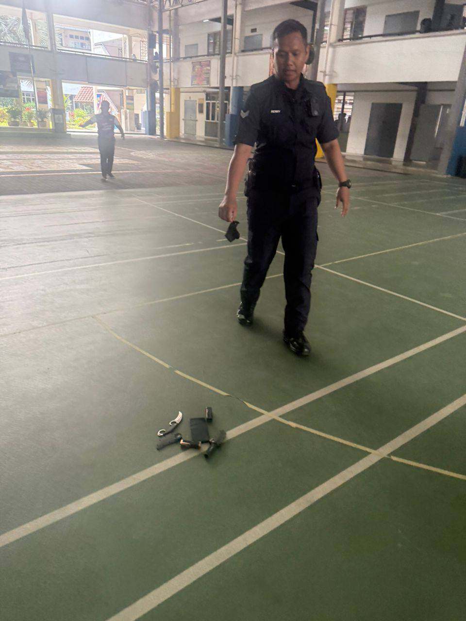Police at the school, where a girl was stabbed to death in Bandar Utama, Malaysia. Photo: Facebook/NGOGreenProjectMalaysia