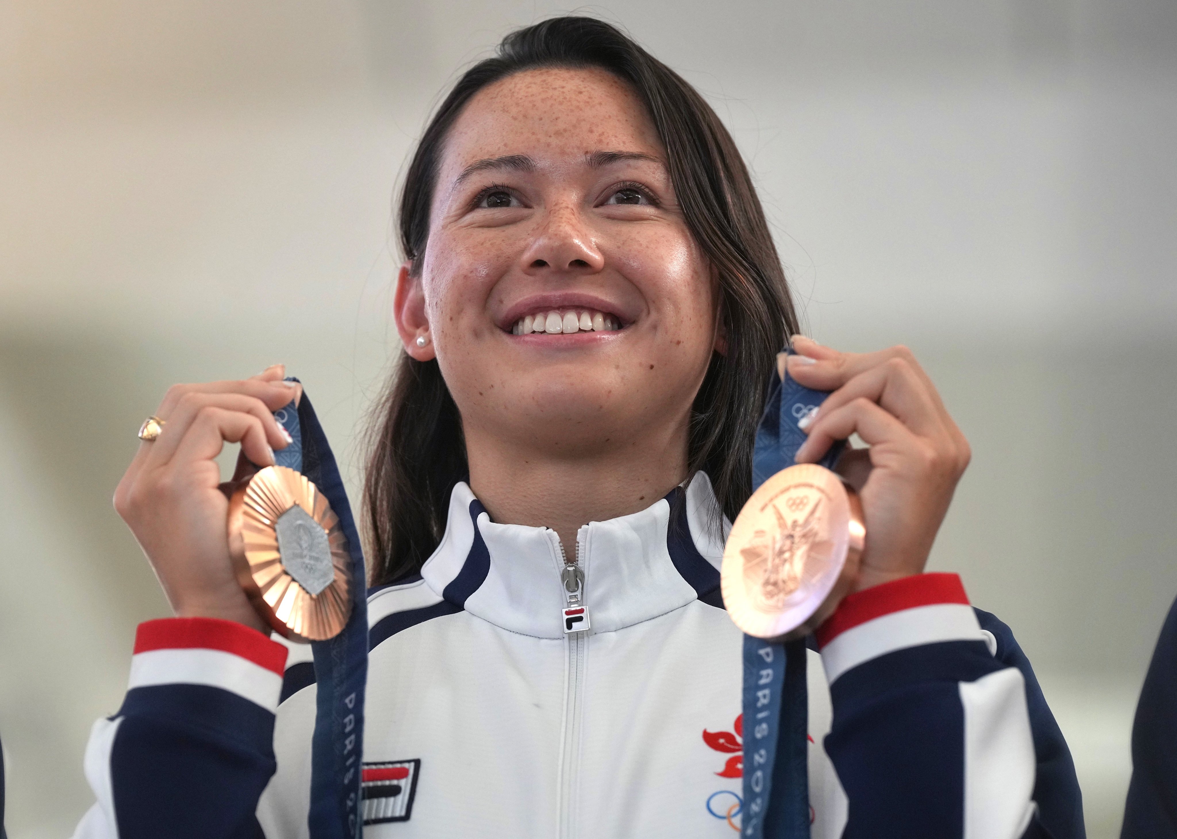 Hong Kong swimmer Siobhan Haughey shows off the two bronze medals she won at the Paris Olympics in 2024. Photo: Elson Li