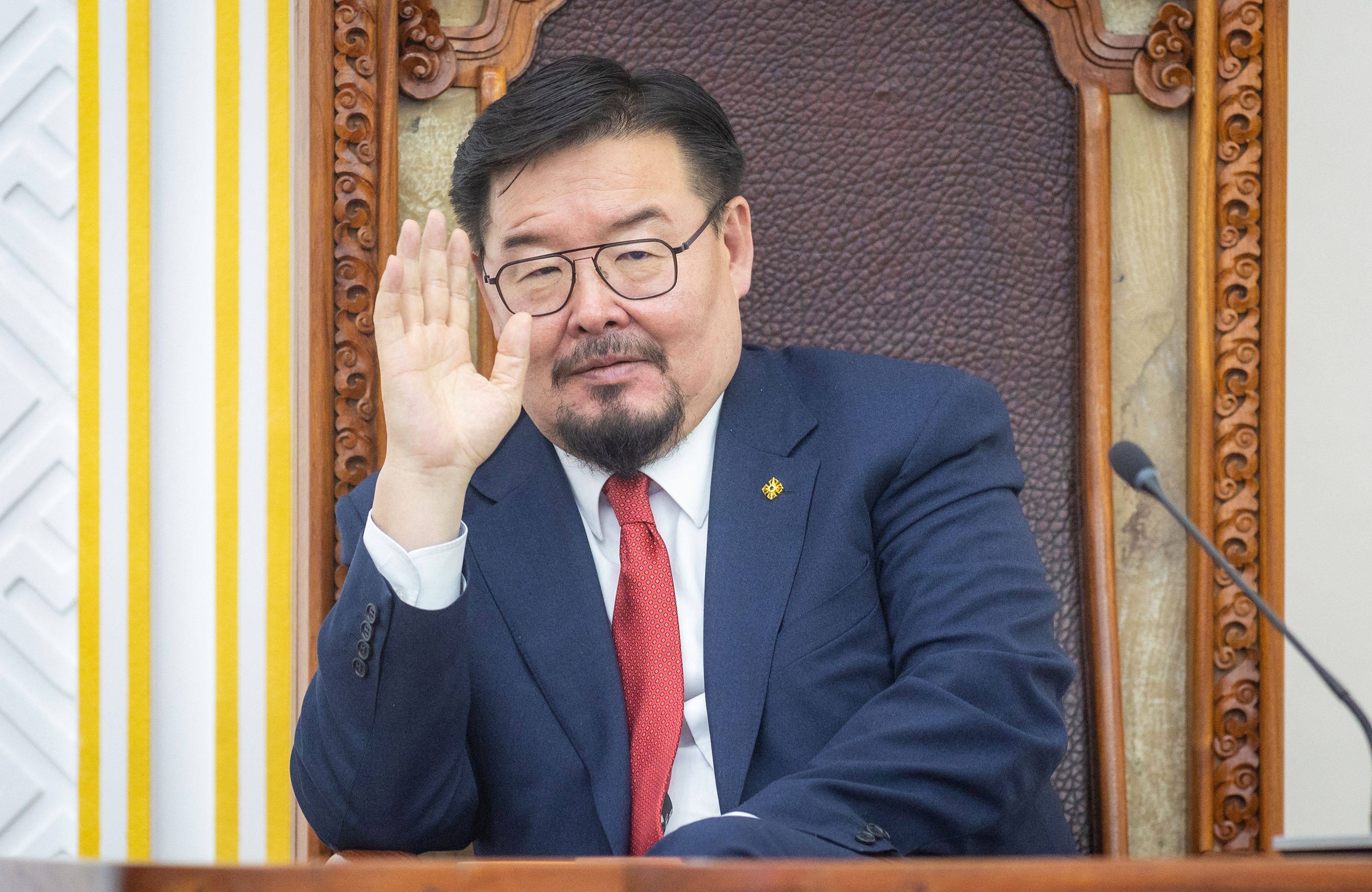 Mongolian Prime Minister Gombojav Zandanshatar gestures as he attends a vote on his dismissal at the parliament in Ulaanbaatar on Friday. Photo: AFP