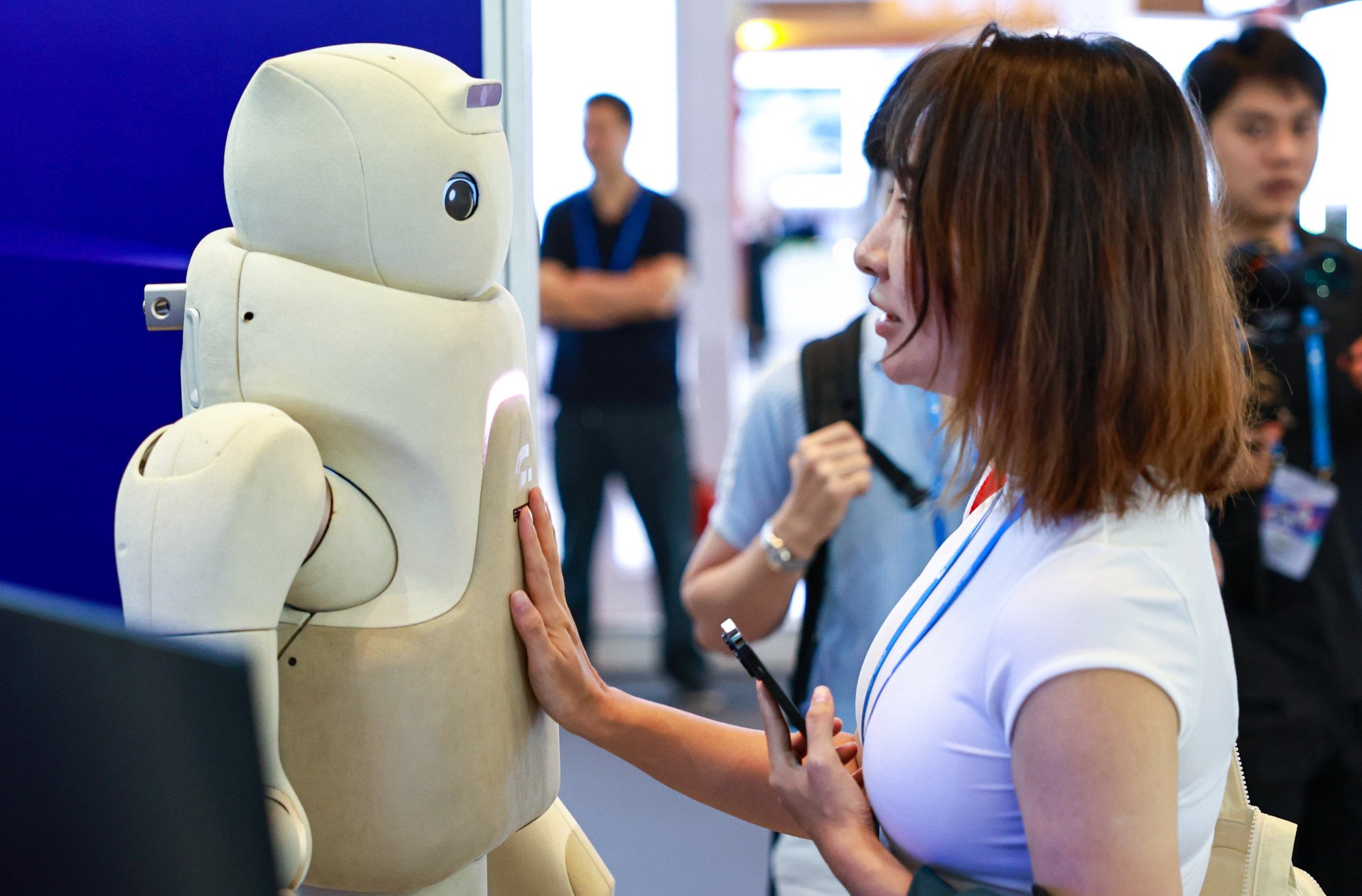 A visitor interacts with a robot at the 2025 Pujiang Innovation Forum held in Shanghai in September. Photo: Xinhua A visitor interacts with a robot at the 2025 Pujiang Innovation Forum held in Shanghai in September. Photo: Xinhua