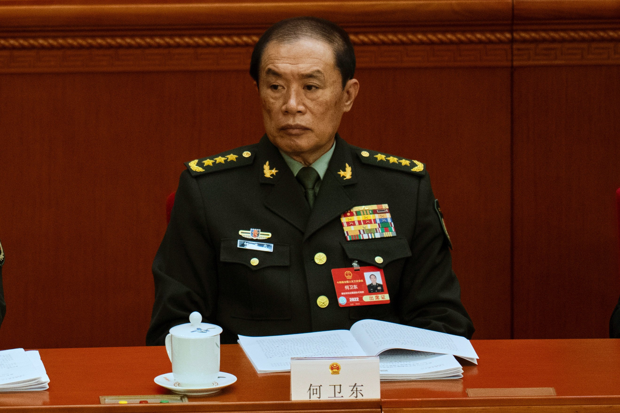 He Weidong, then vice-chairman of the Central Military Commission and member of the Politburo, attends the opening session of the National People’s Congress on March 5. Photo: AP