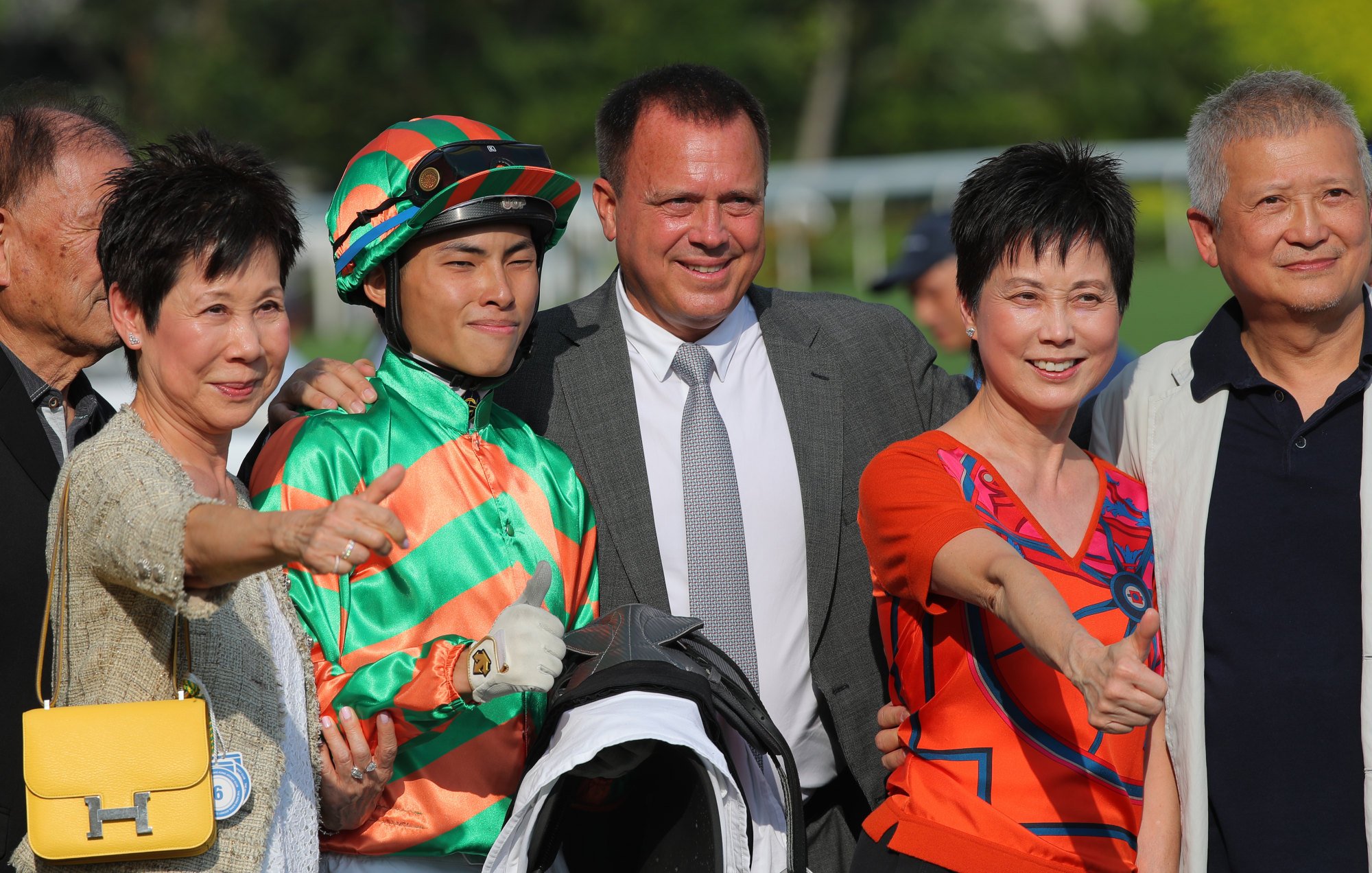 Trainer Caspar Fownes (centre), apprentice Ellis Wong and connections of Pejibaye celebrate his win. Trainer Caspar Fownes (centre), apprentice Ellis Wong and connections of Pejibaye celebrate his win.