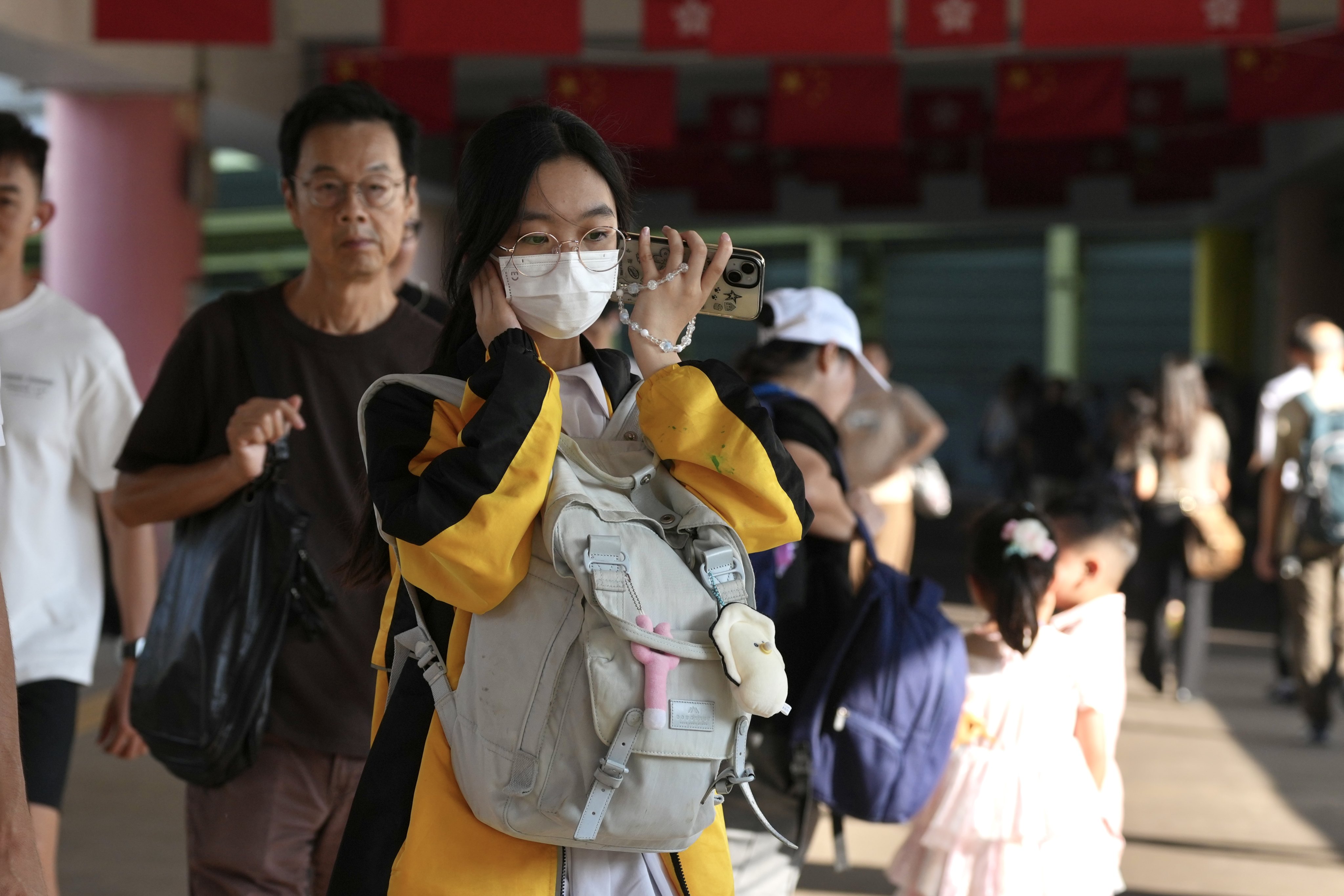Residents don masks as the city battles with flu season.  Photo: Karma Lo