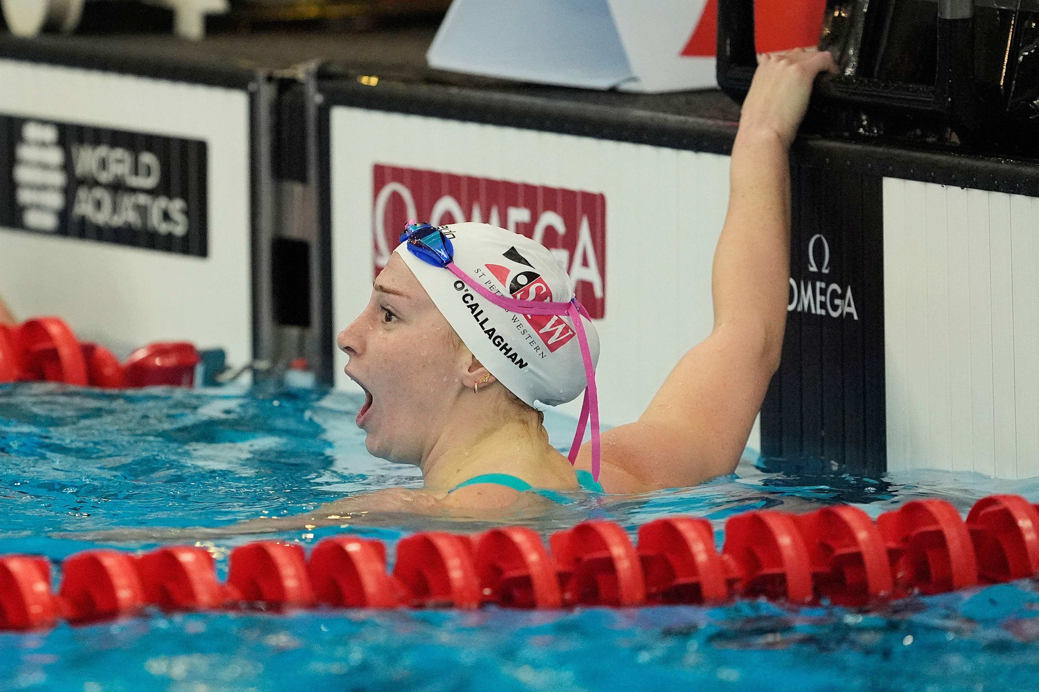 A shocked Mollie O’Callaghan reacts after setting a world record and winning the women’s 200m freestyle final at the World Cup event in Westmont. Photo: Getty Images