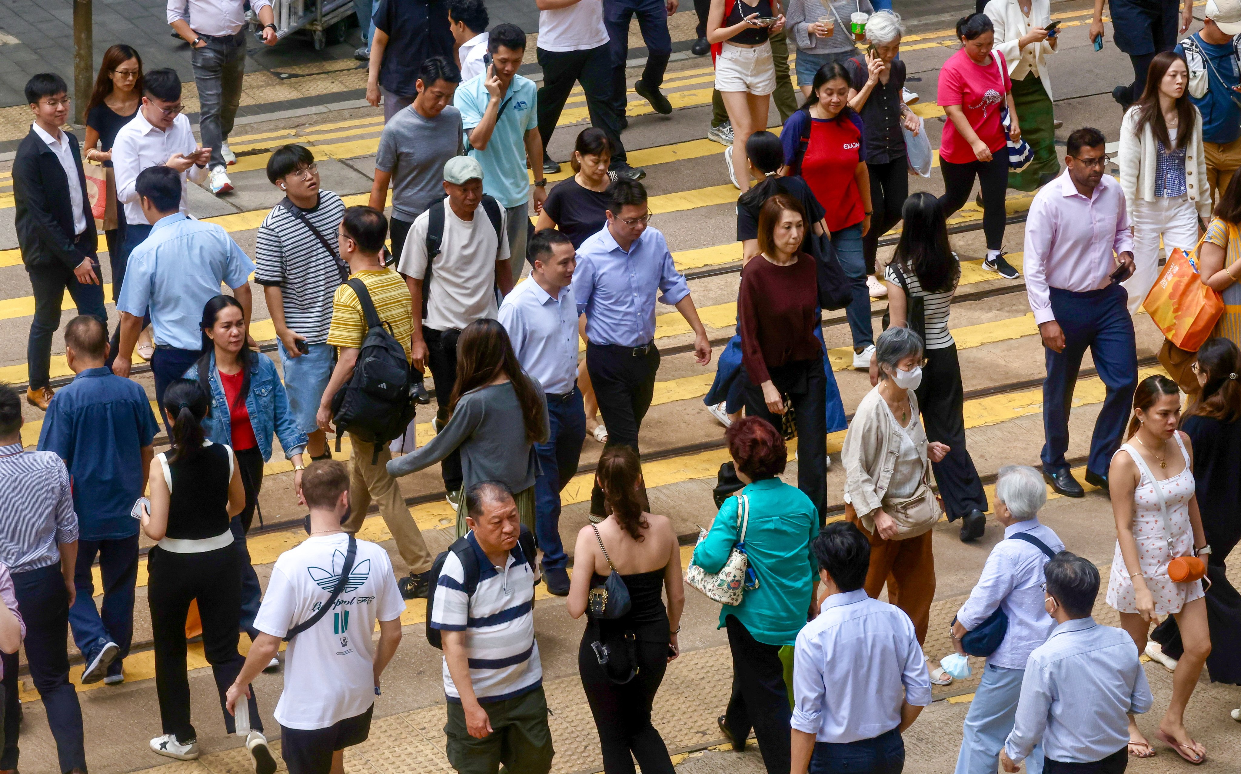 Secretary for Labour and Welfare Chris Sun says some sectors will continue to face challenges during the economic restructuring. Photo: Jonathan Wong