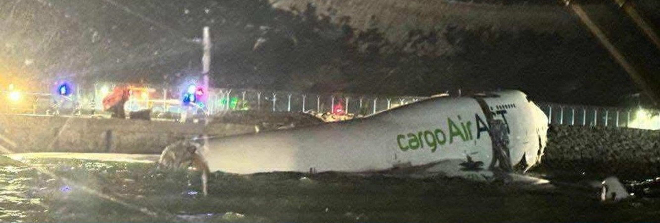 Emirates flight EK9788 (a Boeing 747 freighter) from Dubai veered off the runway at Hong Kong International Airport and landed in the sea, striking a ground vehicle on the way, police said. Photo: Handout