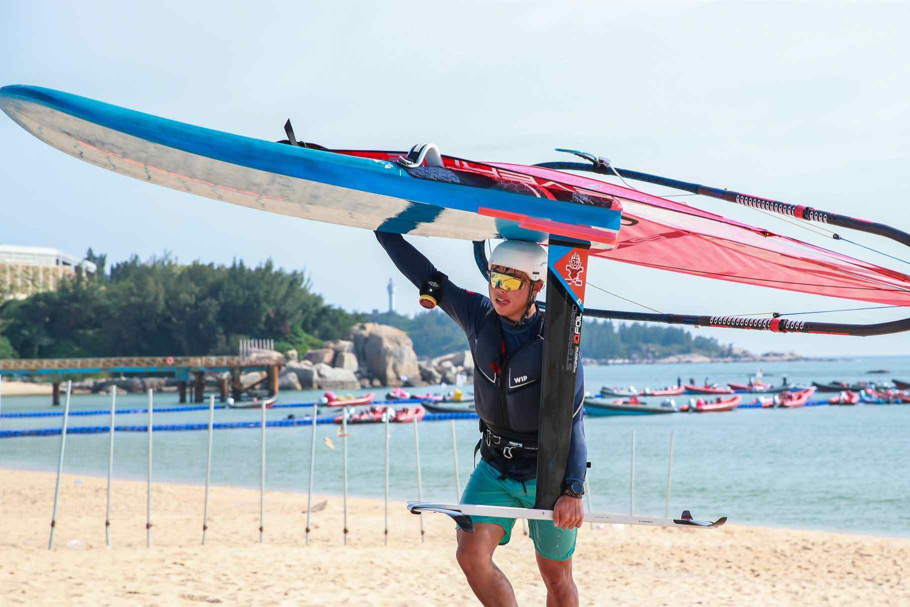Au Ling-yeung leaves the water after the first day of the windsurfing competition. Photo: Handout