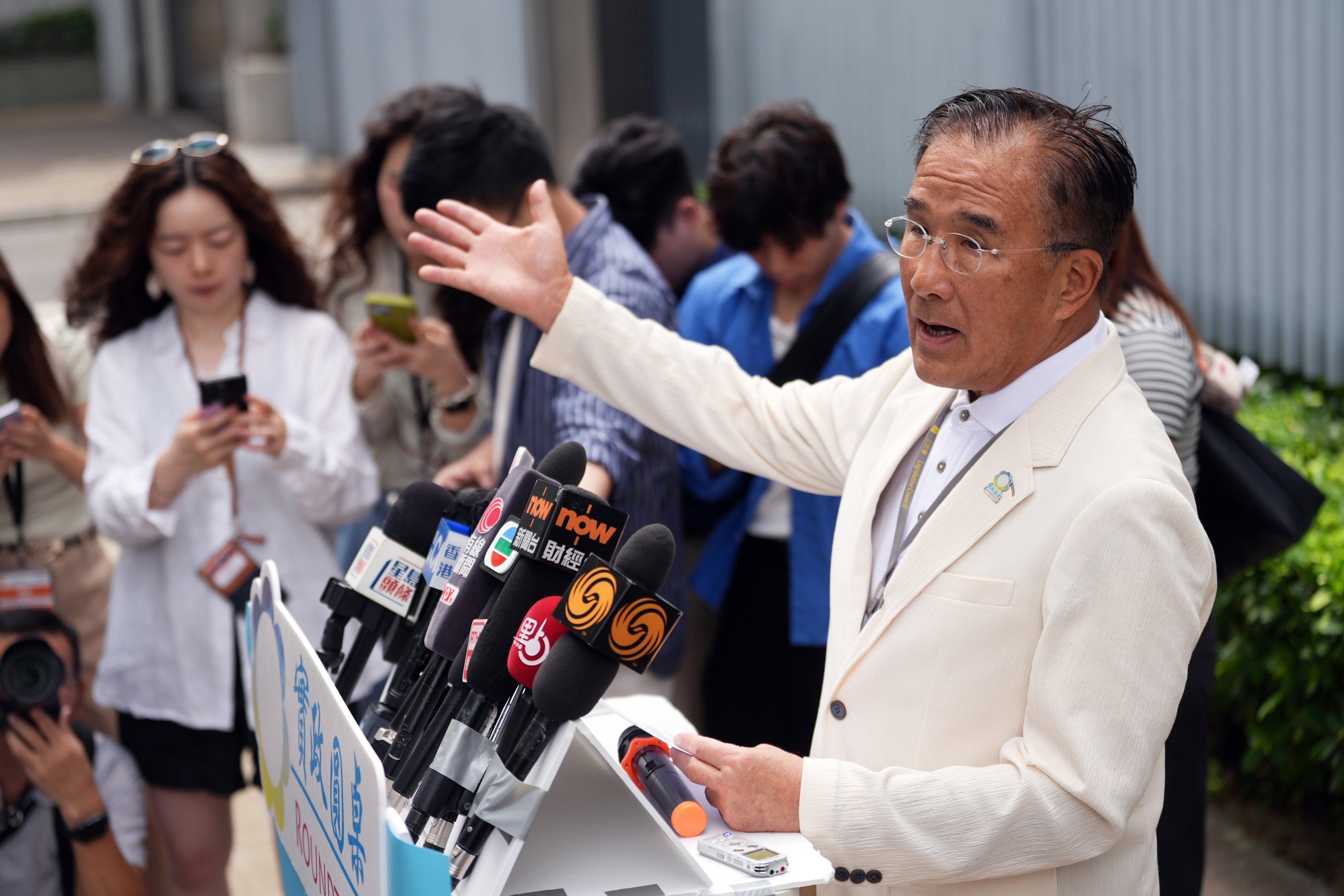 Lawmaker Michael Tien Puk-sun speaks to the media. Photo: Eugene Lee