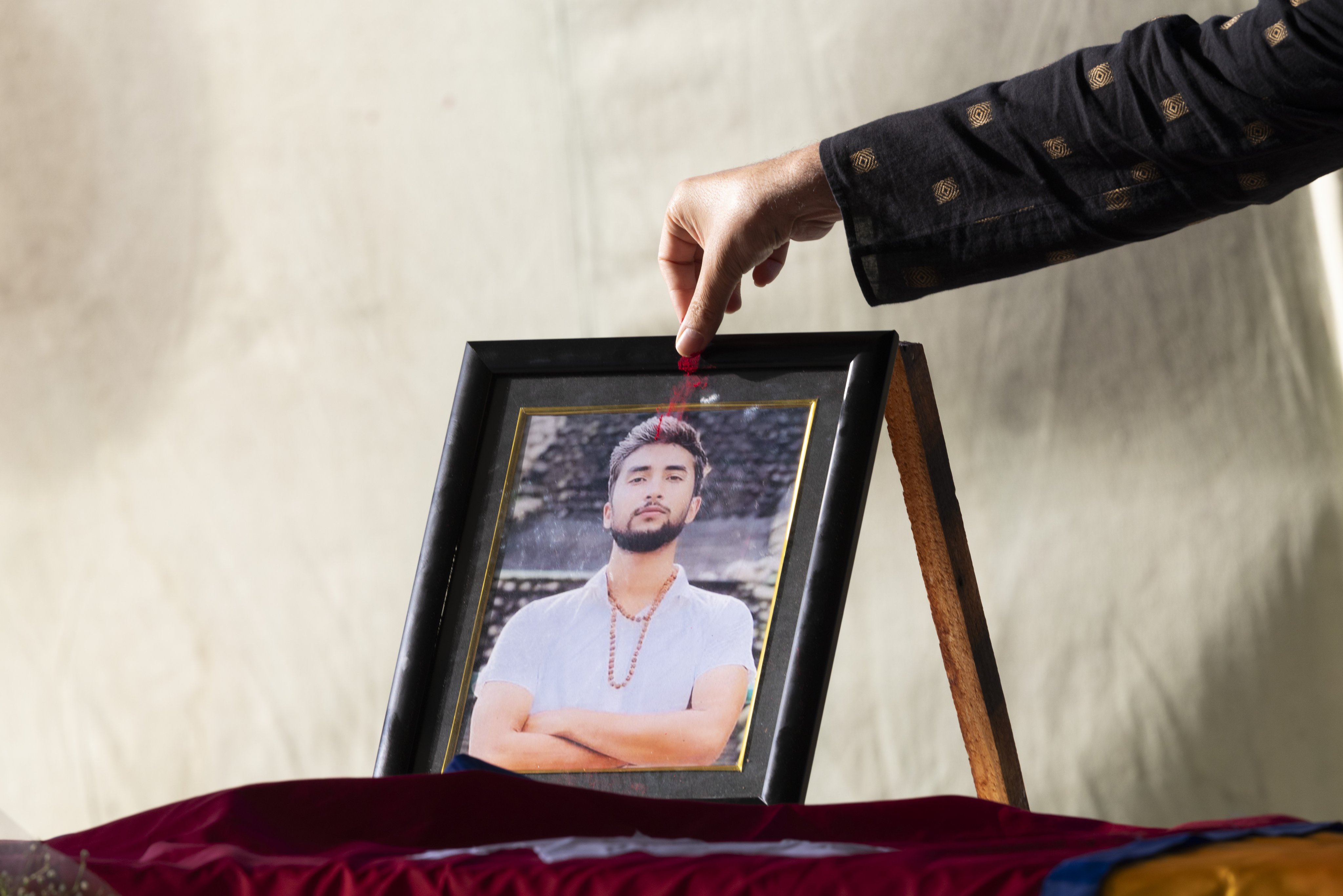 Nepalese people mourn next to the coffin of late Nepalese hostage Bipin Joshi on Monday. Photo: EPA