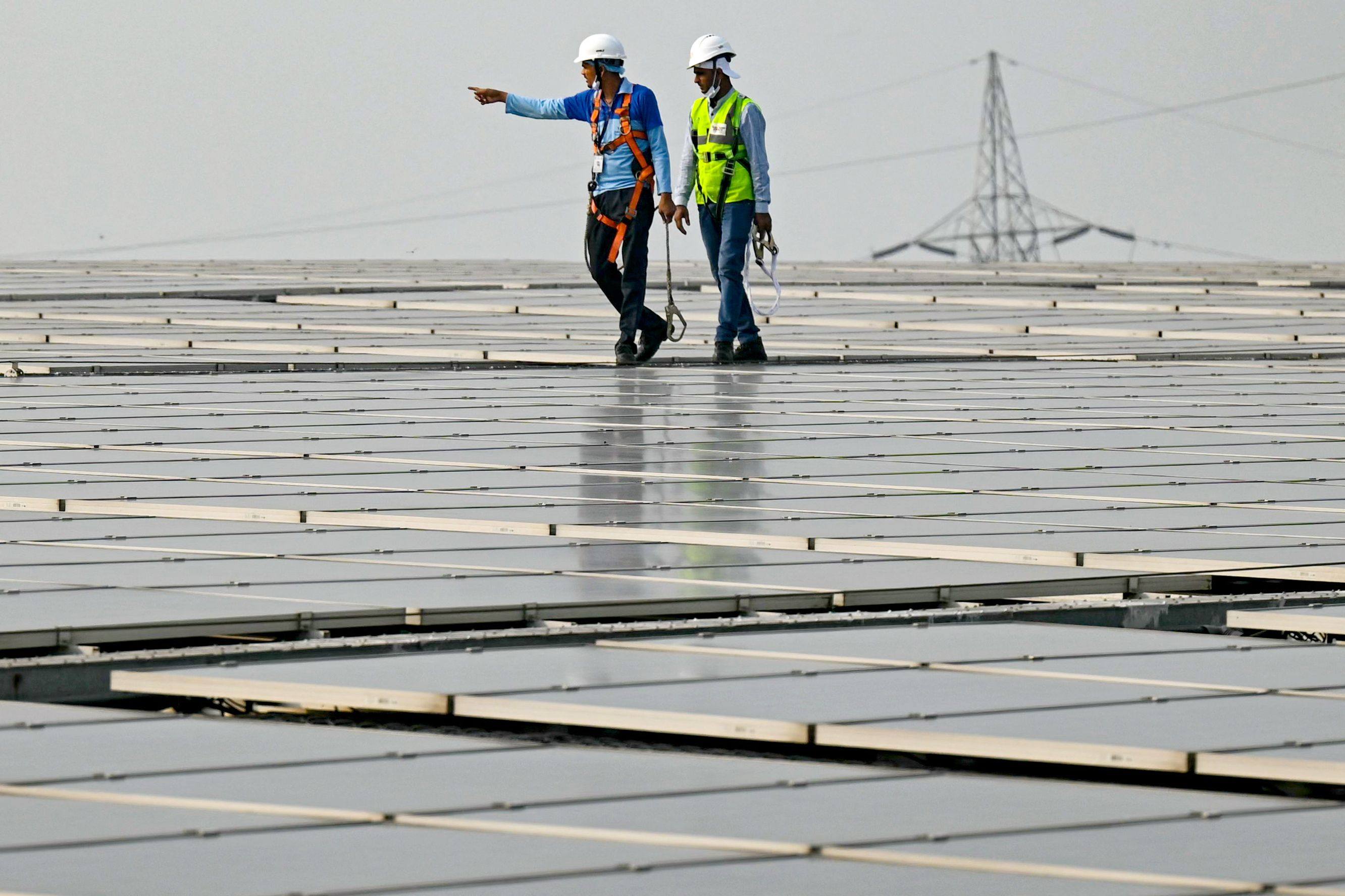 Employees inspect solar panels installed at a food processing plant in Greater Noida. India and Brazil have agreed to raise bilateral trade and expand cooperation in sectors spanning automobiles, IT, clean energy and agriculture. Photo: AFP
