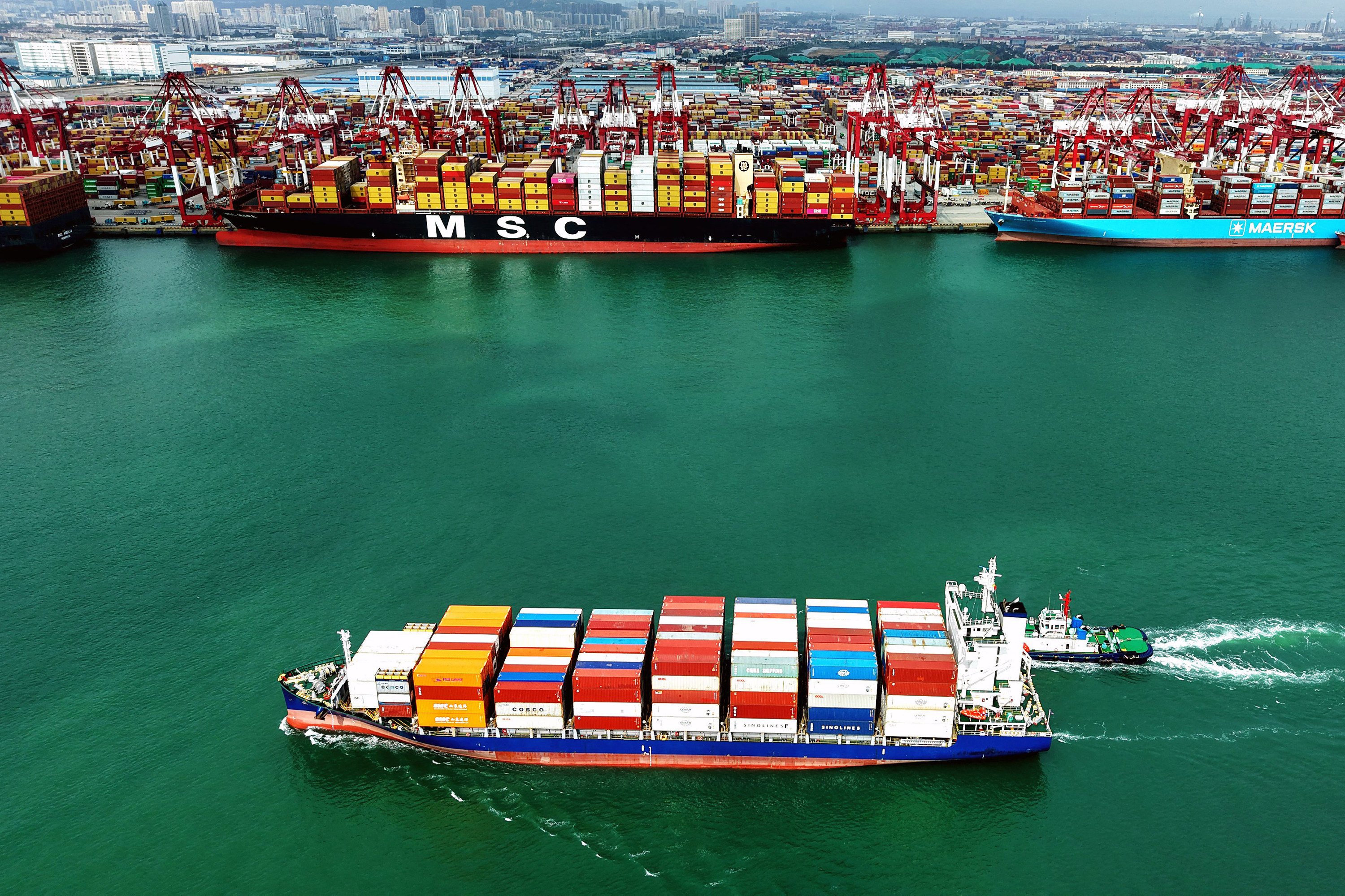 A container ship sails near a port in China’s eastern Shandong province. China remains the world’s leading shipbuilder despite efforts by the United States to curtail its dominance. Photo: AFP