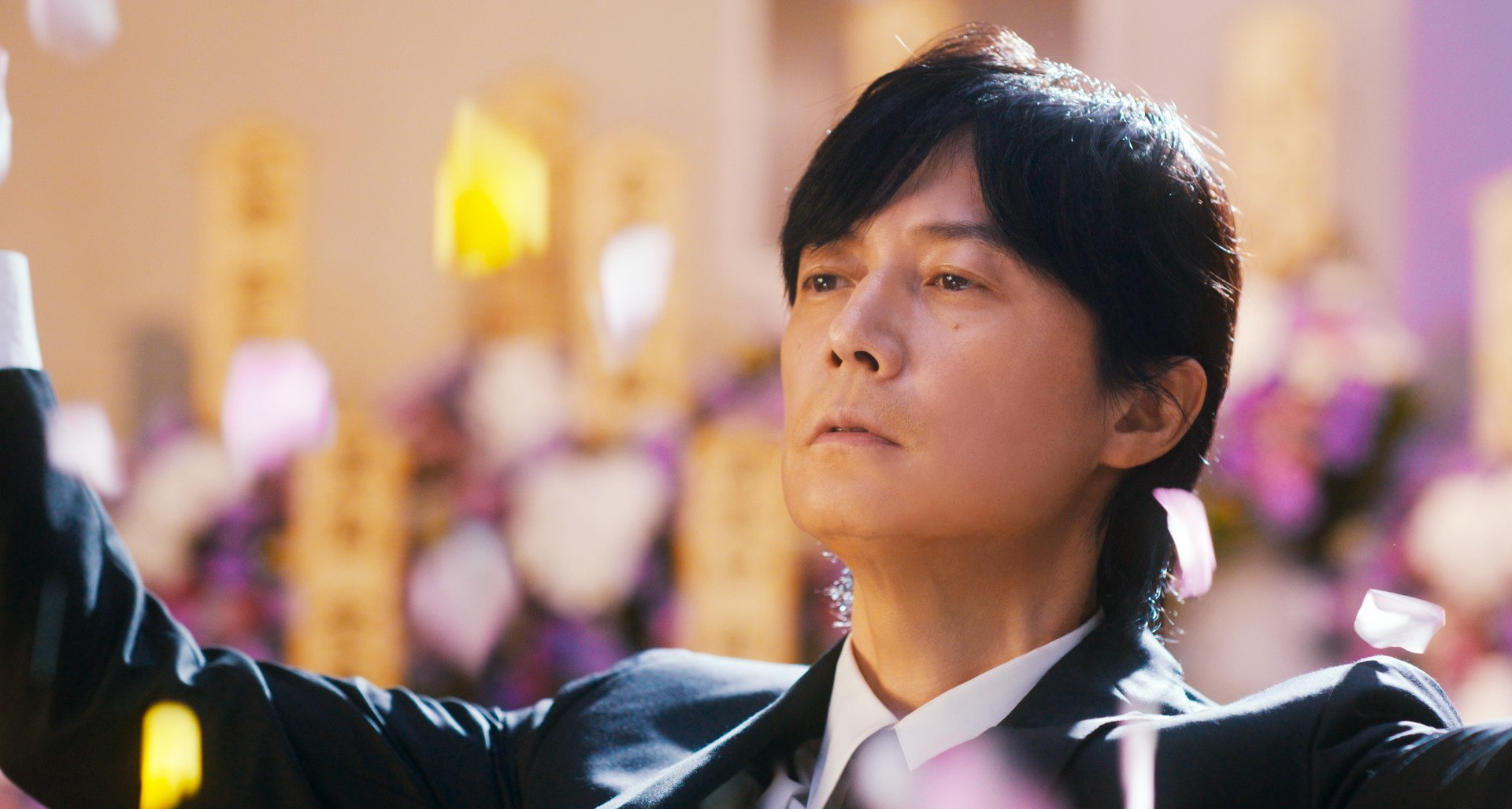 Masaharu Fukuyama in a still from Black Showman (category: IIA, Japanese), co-starring Kasumi Arimura and directed by Ryo Tanaka.