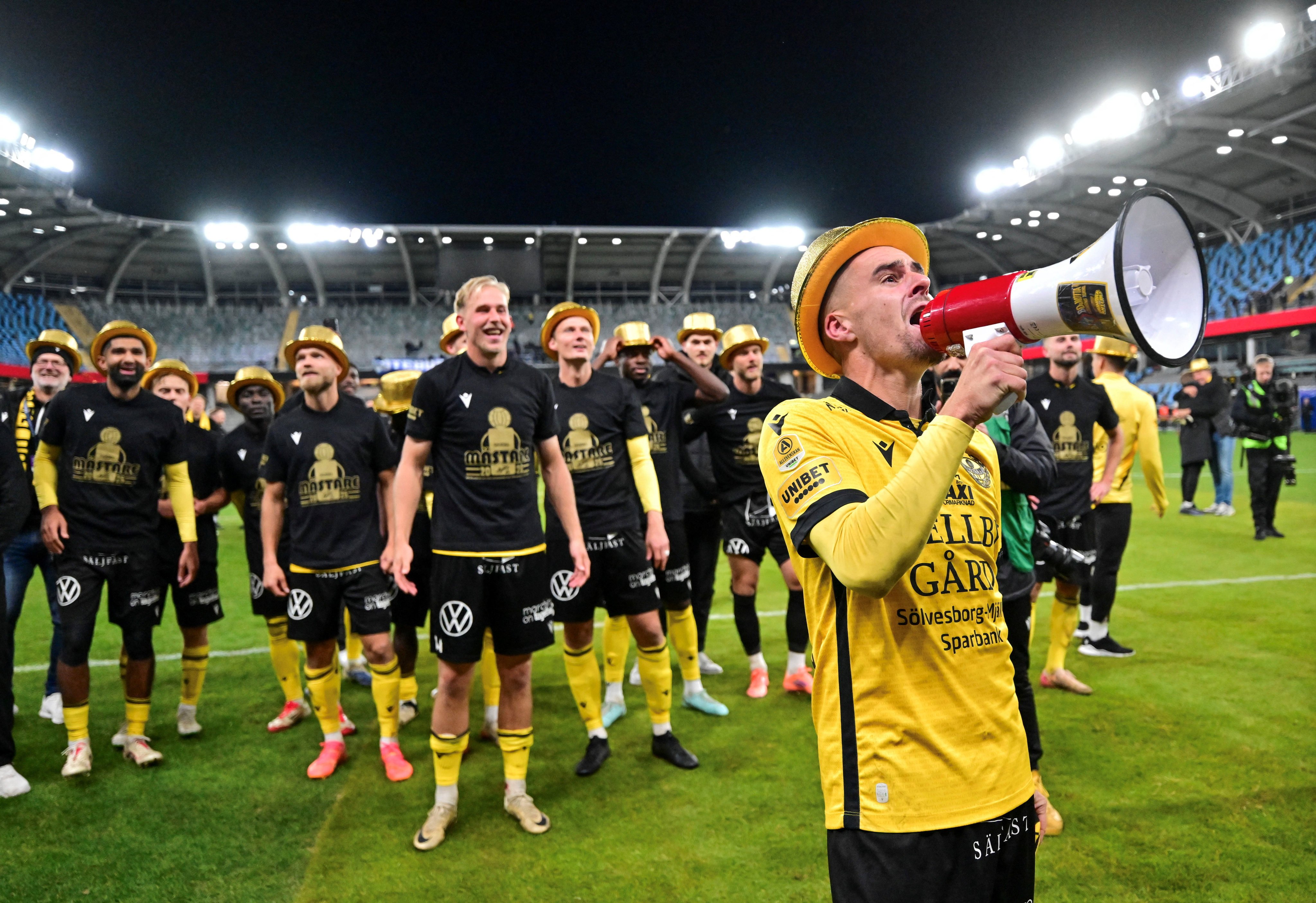 Mjallby captain Jesper Gustavsson (right) and teammates celebrate after winning at Gothenburg to clinch the league title on Monday. Photo: Reuters