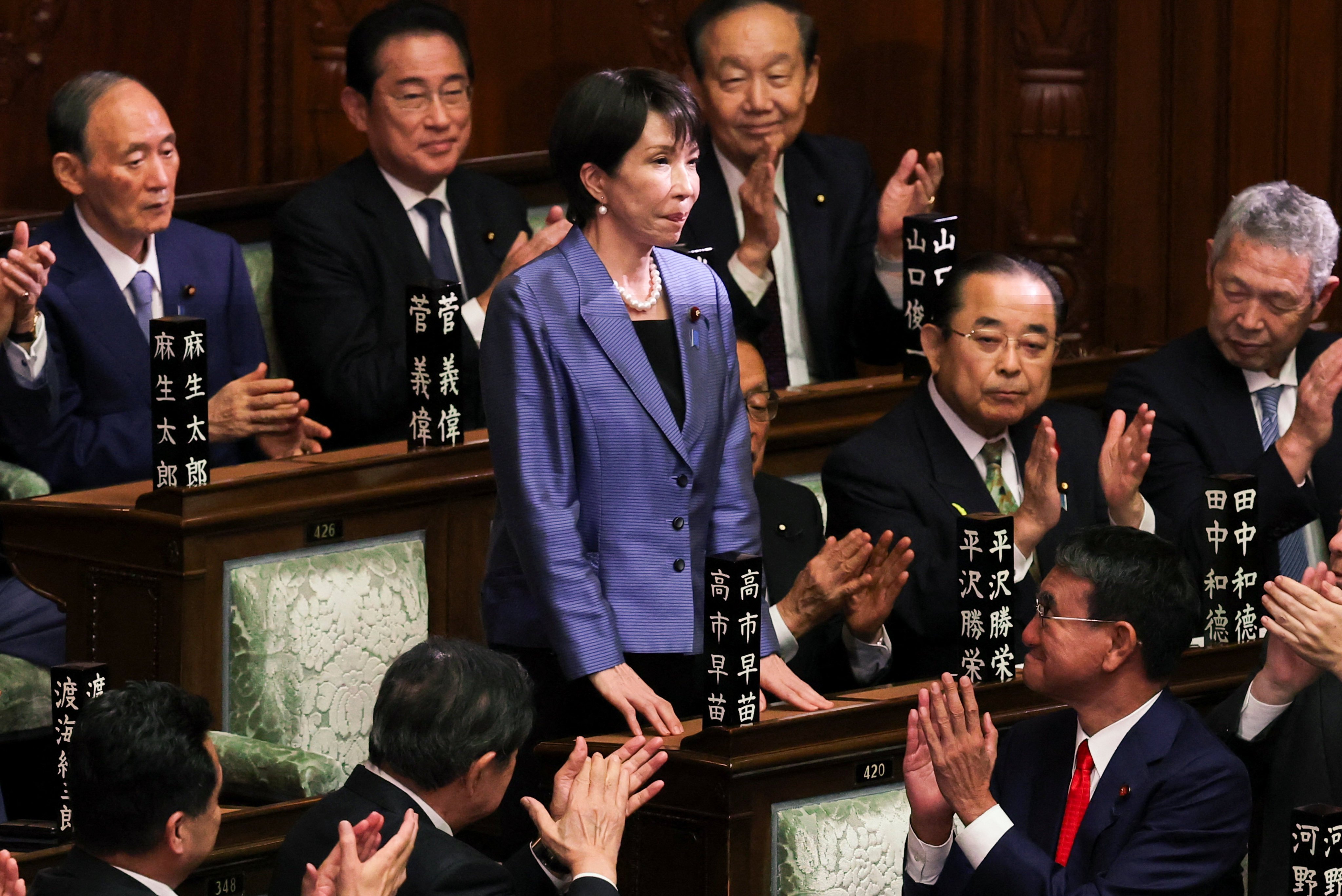 Sanae Takaichi receives applause after being elected as Japan’s prime minister at the Lower House of Parliament in Tokyo on Tuesday. Photo: Reuters