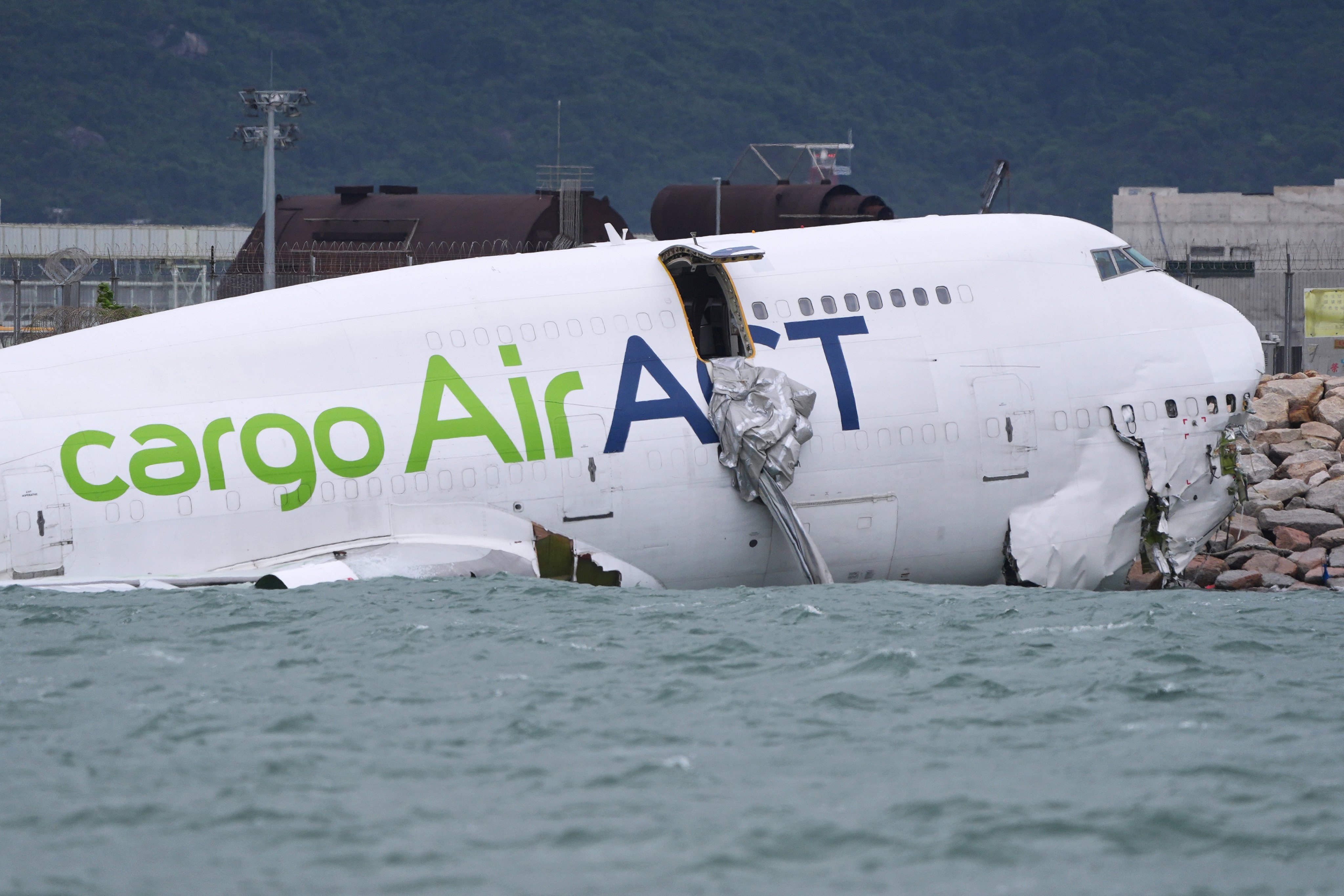 The wreckage of Emirates SkyCargo flight 9788 is seen at the shore of Hong Kong airport’s north runway. Photo: Elson Li