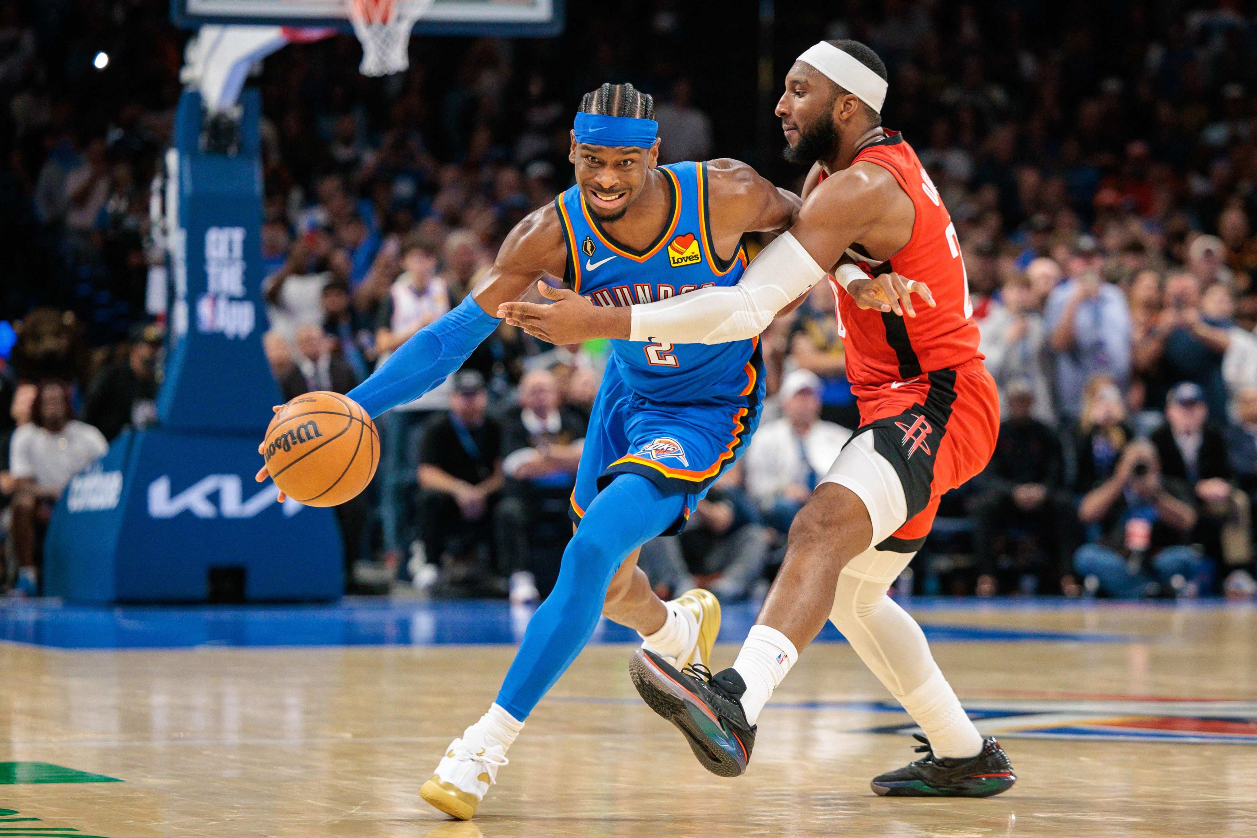 Oklahoma City Thunder’s’ Shai Gilgeous-Alexander drives around the Houston Rockets’ Josh Okogie during the second half in Oklahoma City. Photo: Getty Images