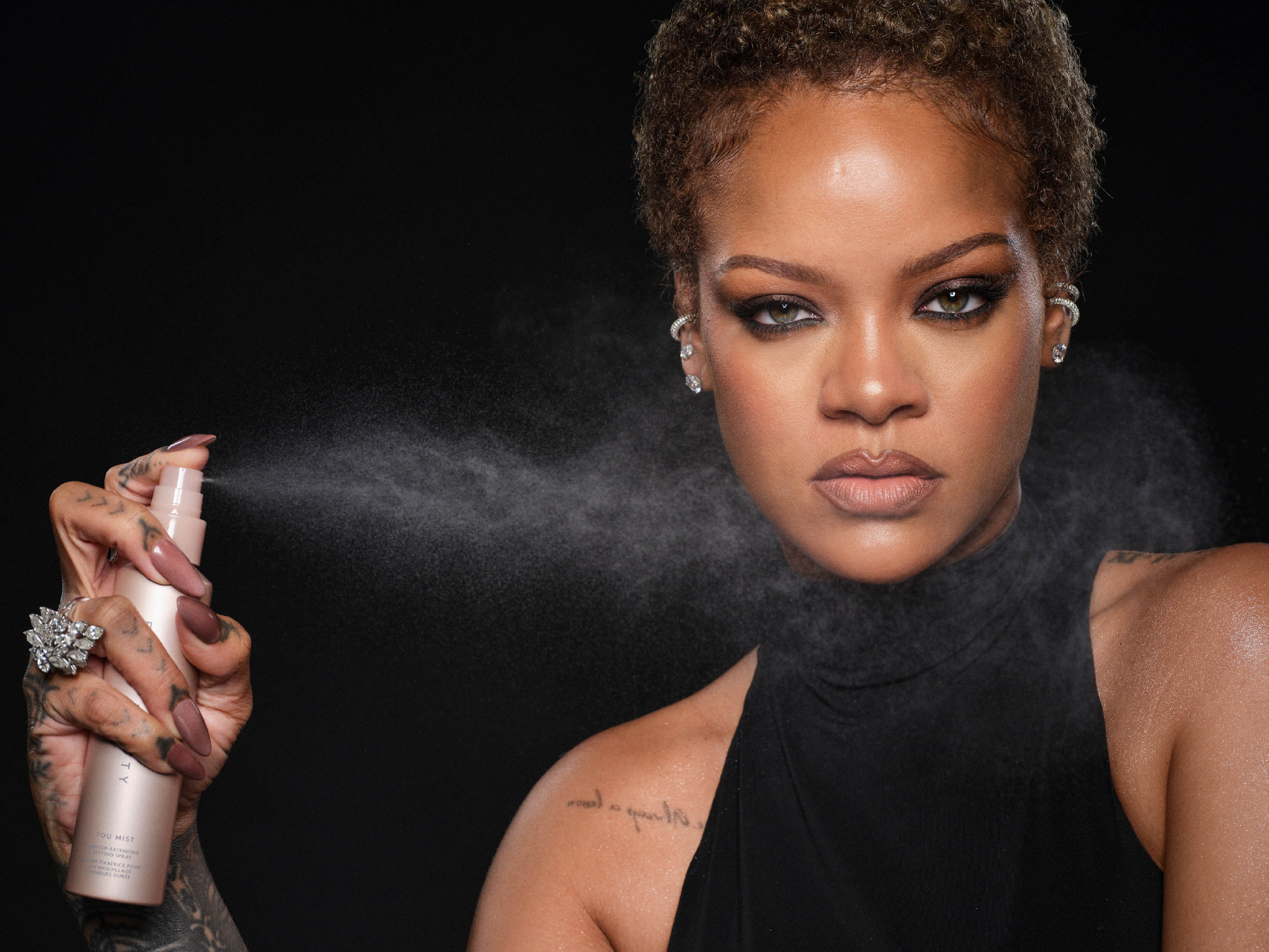 Fenty Beauty’s You Mist Makeup-Extending Setting Spray promises to “lock in your look and serve skin hydration”. Photo: Handout