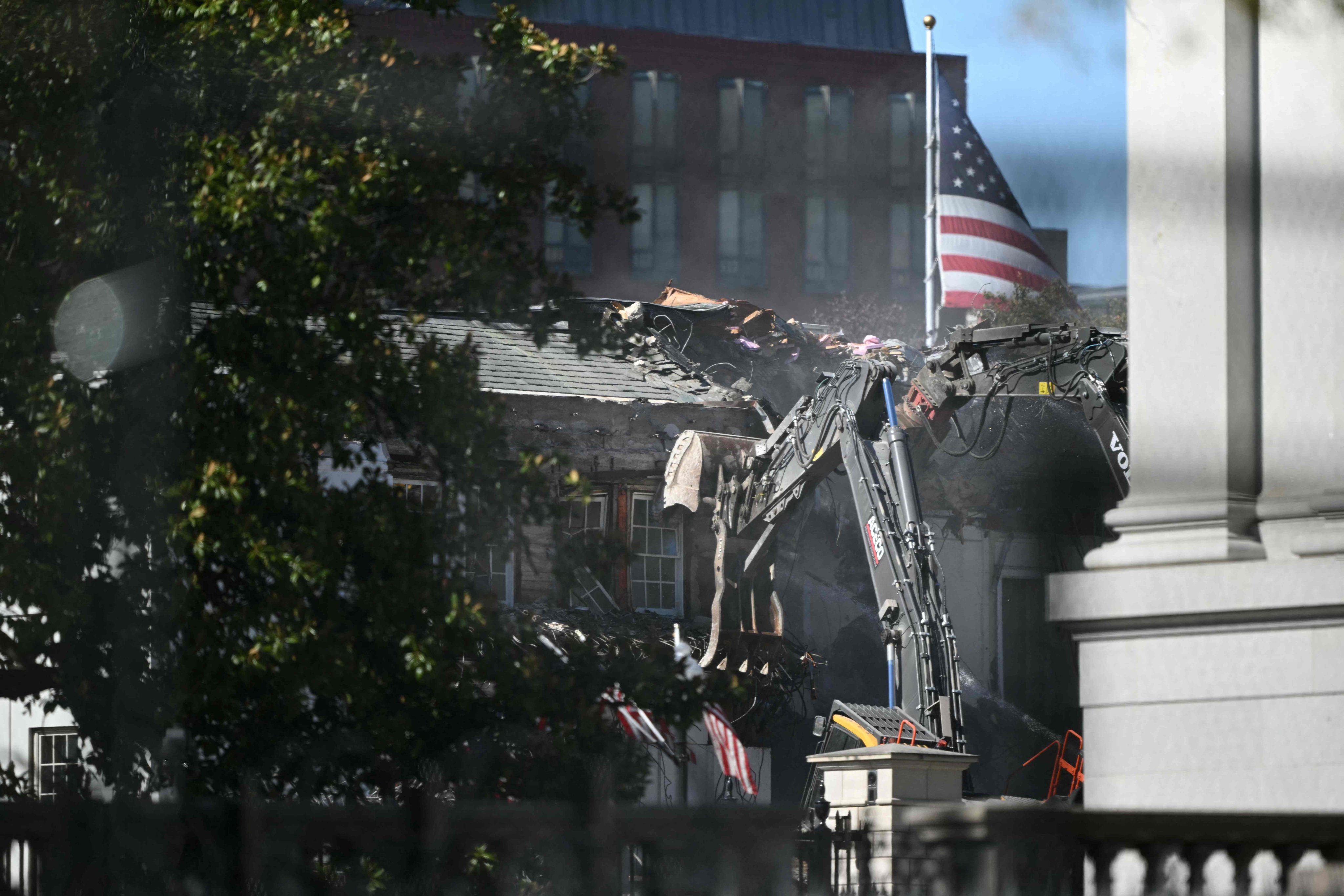 Heavy machinery tears down a section of the East Wing of the White House for Donald Trump’s planned ballroom. Photo: AFP