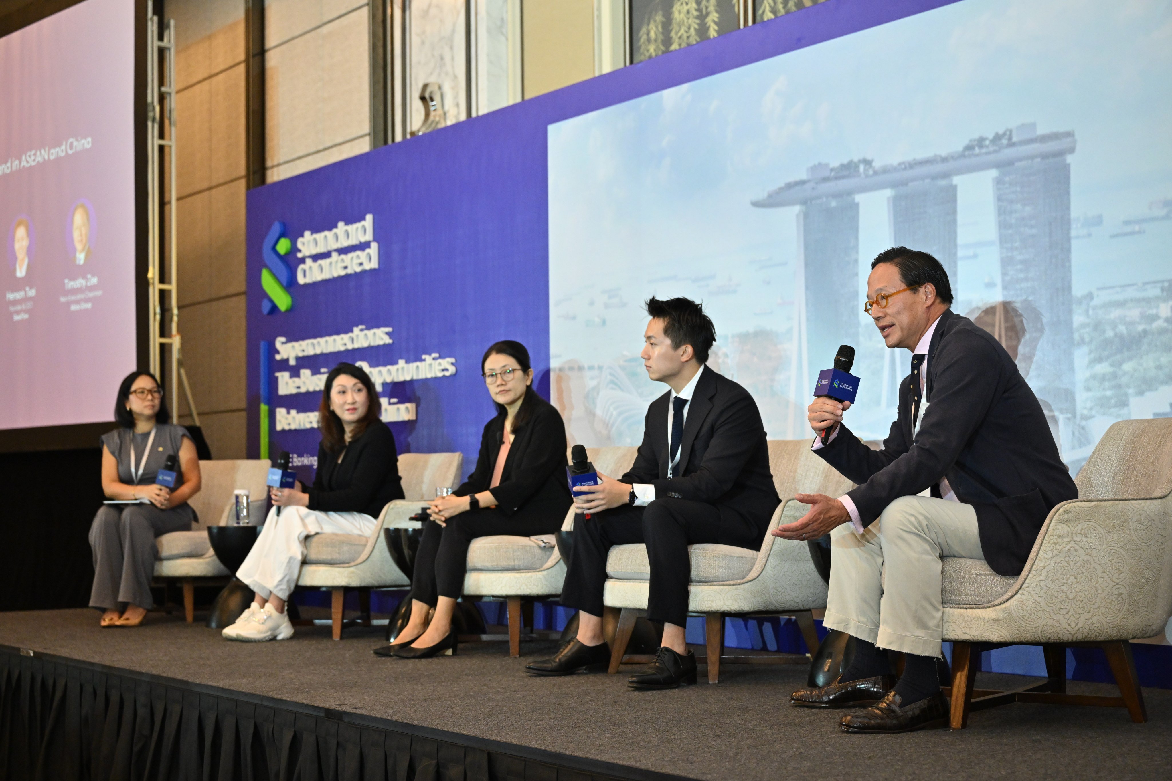 Timothy Zee (far right), non-executive chairman of Altios International, makes a point during the panel discussion with (from left) moderator Celine Asril, strategy director at Morning Studio, Standard Chartered executives Teresa Tah and Audrey Goh, and Henson Tsai, founder and CEO of SleekFlow, at the “Superconnections: The Business Opportunities Between SEA (Southeast Asia) & China” forum. Photo: SCMP