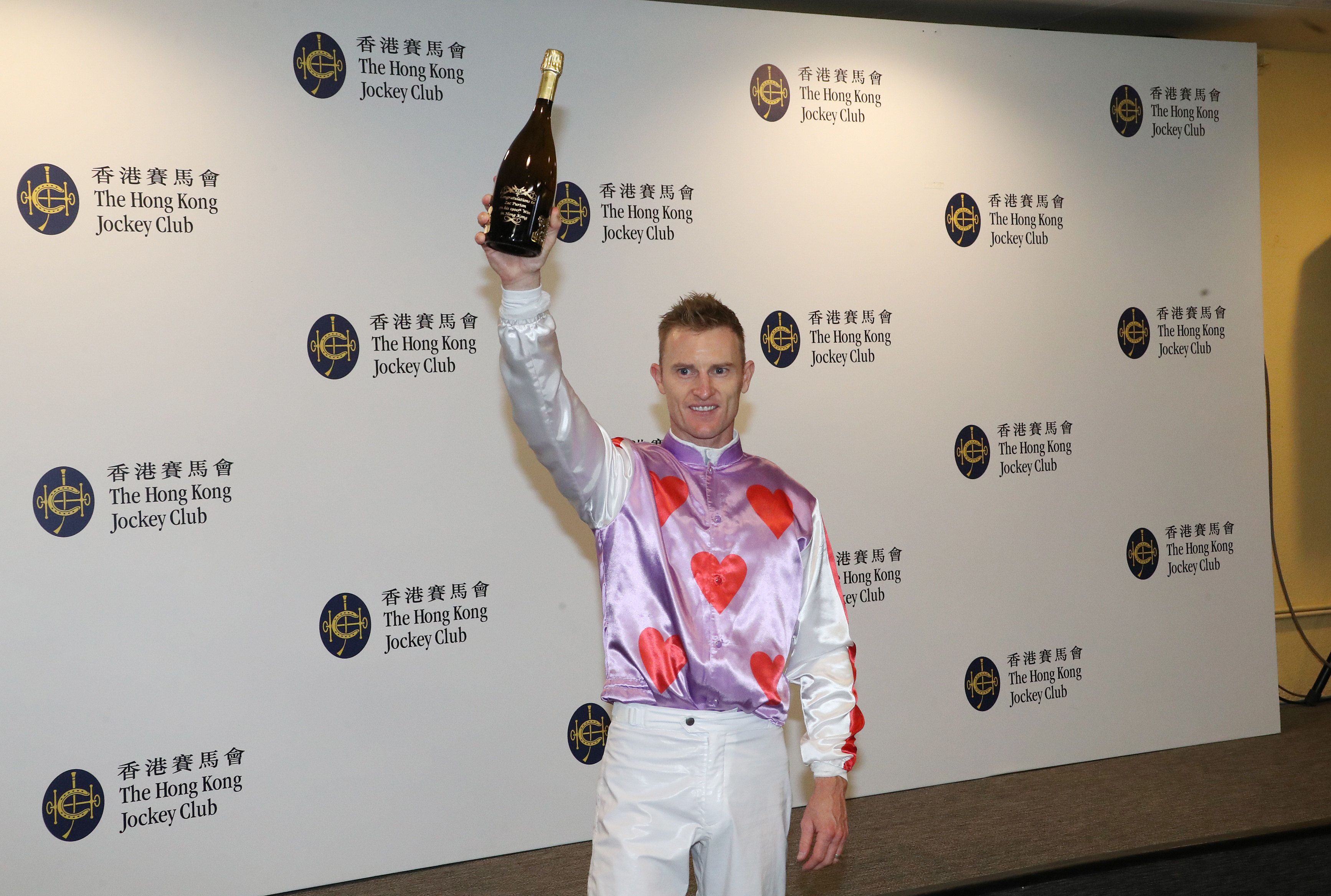 Zac Purton celebrates his 1,900th Hong Kong win. Photos: Kenneth Chan