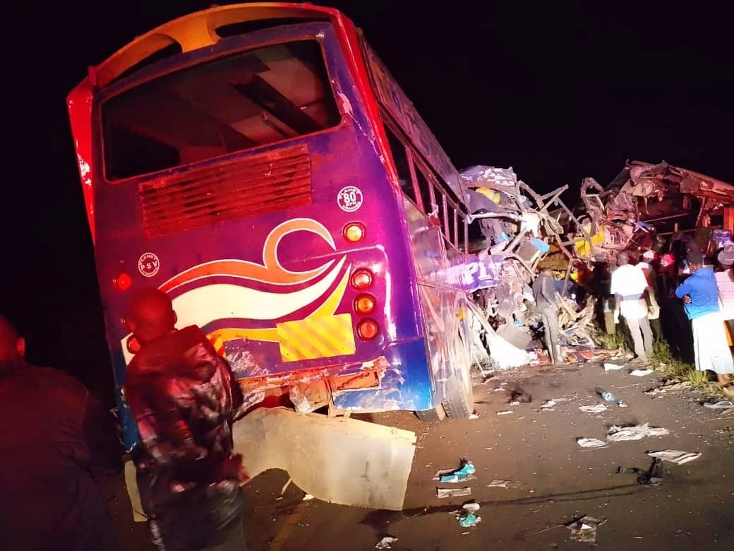 People gather at the scene of a multiple vehicle collision in Uganda on Wednesday. Photo: AP